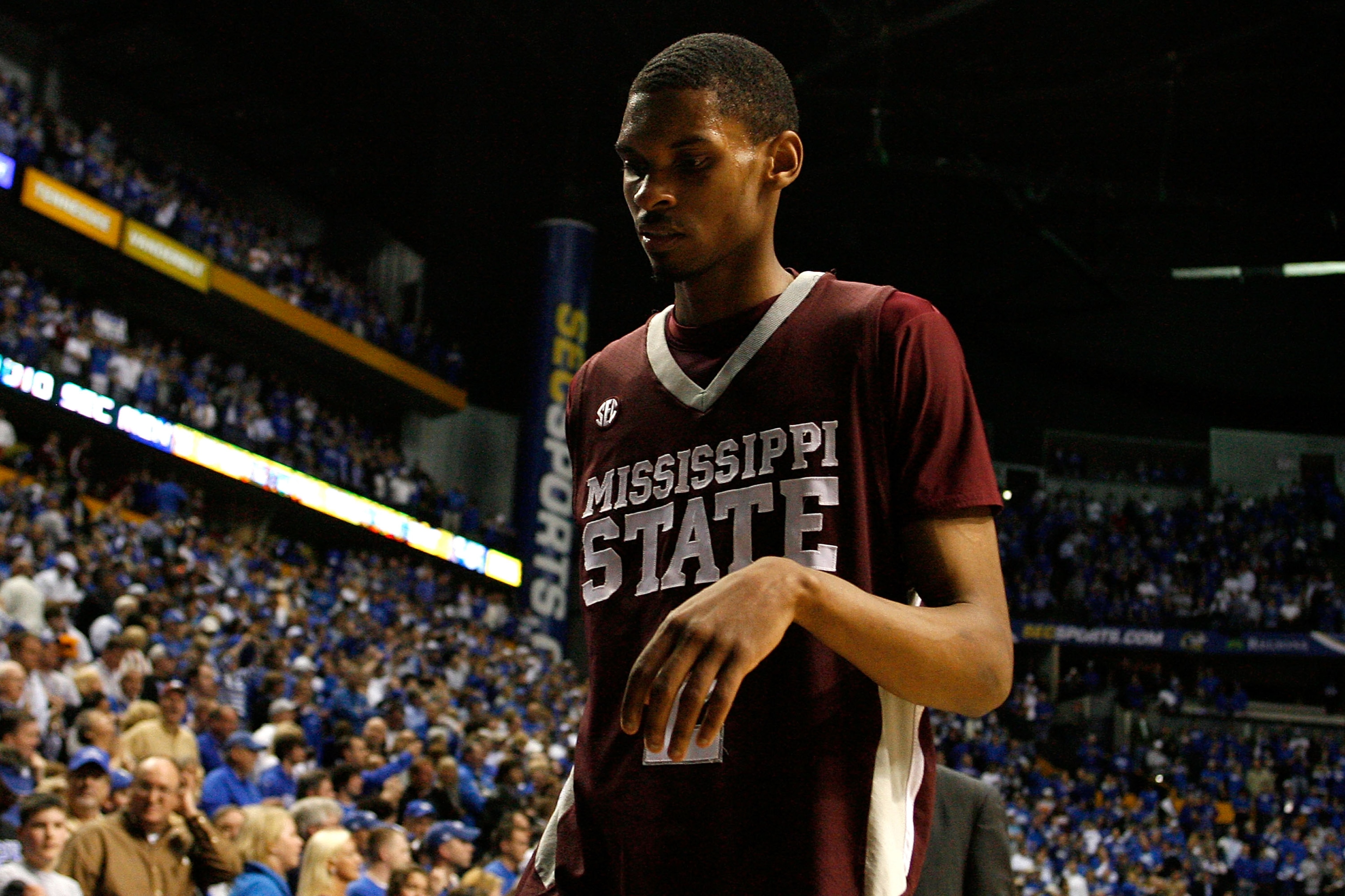 NASHVILLE, TN - MARCH 14:  Ravern Johnson #2 of the Mississippi State Bulldogs walks off the court dejected after Mississippi lost 75-74 in overtime against the Kentucky Wildcats during the final of the SEC Men's Basketball Tournament at the Bridgestone A
