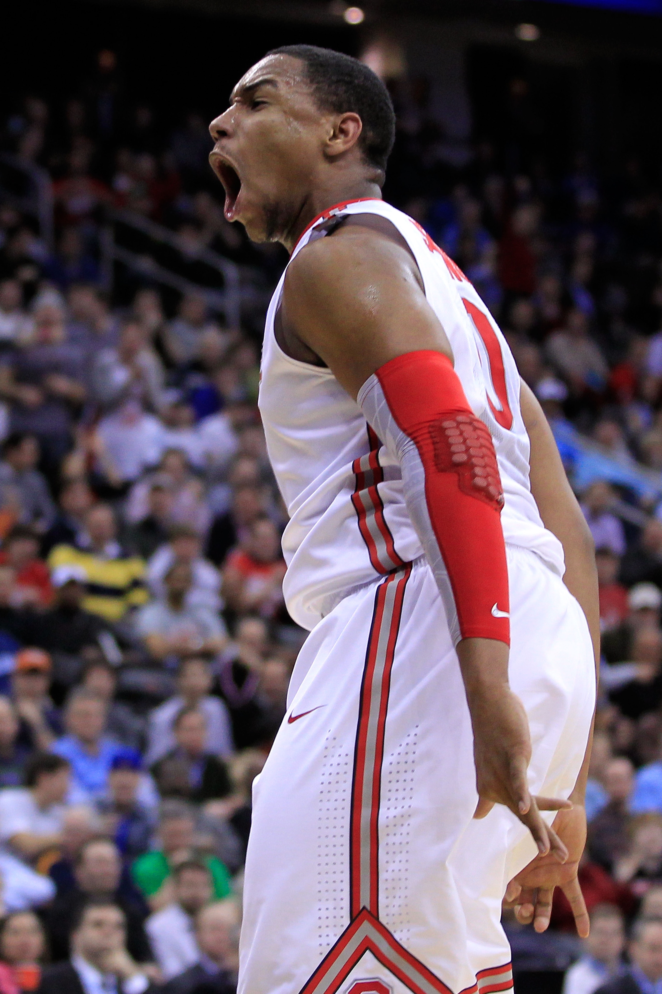 NEWARK, NJ - MARCH 25:  Jared Sullinger #0 of the Ohio State Buckeyes reacts after a point against the Kentucky Wildcats during the east regional semifinal of the 2011 NCAA Men's Basketball Tournament at the Prudential Center on March 25, 2011 in Newark,