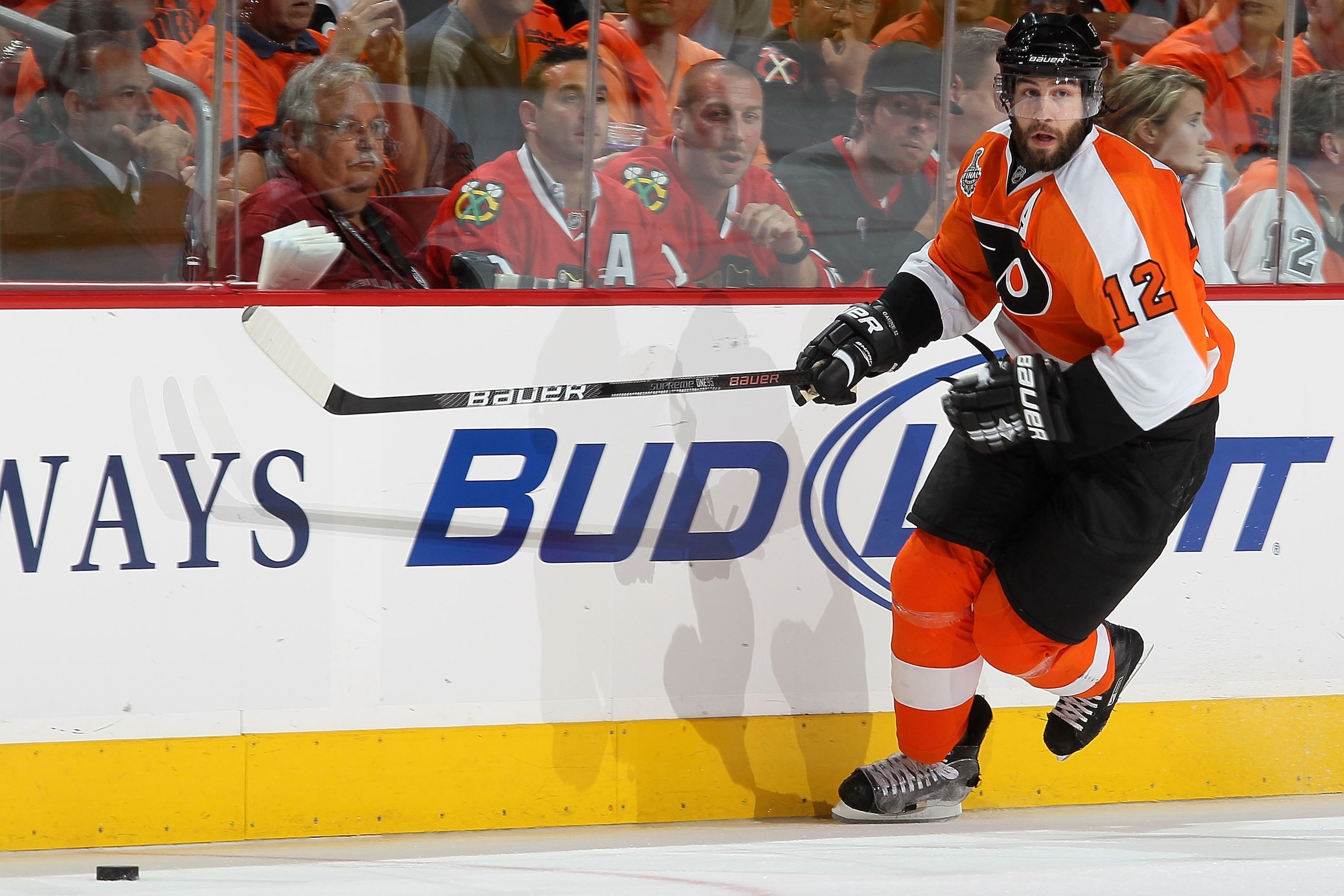 PHILADELPHIA - JUNE 04:  Simon Gagne #12 of the Philadelphia Flyers skates to the puck in Game Four of the 2010 NHL Stanley Cup Final against the Chicago Blackhawks at Wachovia Center on June 4, 2010 in Philadelphia, Pennsylvania.  (Photo by Jim McIsaac/G