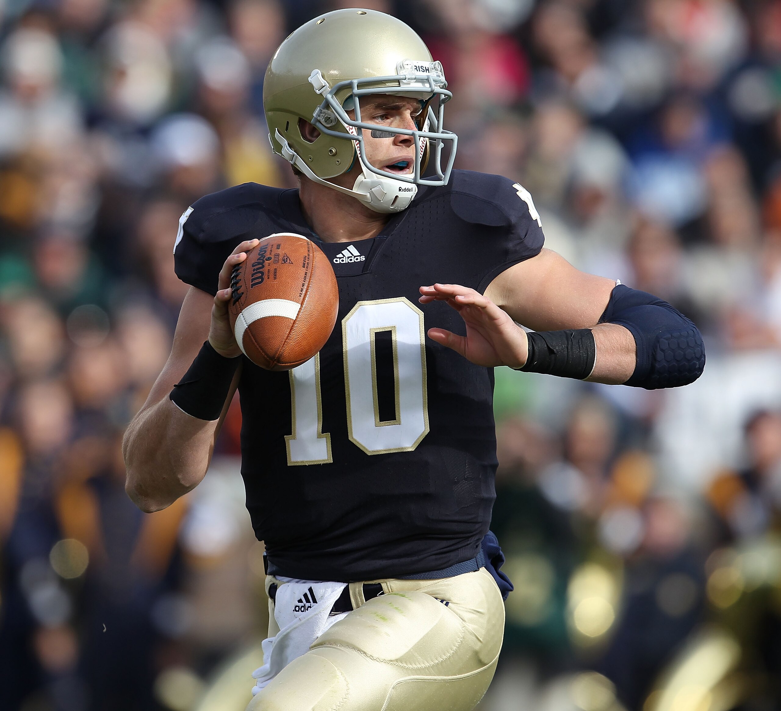 SOUTH BEND, IN - OCTOBER 30: Dayne Crist #10 of the Notre Dame Fighting Irish looks for a receiver against the Tulsa Golden Hurricane at Notre Dame Stadium on October 30, 2010 in South Bend, Indiana. Tulsa defeated Notre Dame 28-27. (Photo by Jonathan Dan SOUTH BEND, IN - OCTOBER 30: Dayne Crist #10 of the Notre Dame Fighting Irish looks for a receiver against the Tulsa Golden Hurricane at Notre Dame Stadium on October 30, 2010 in South Bend, Indiana. Tulsa defeated Notre Dame 28-27. (Photo by Jonathan Dan