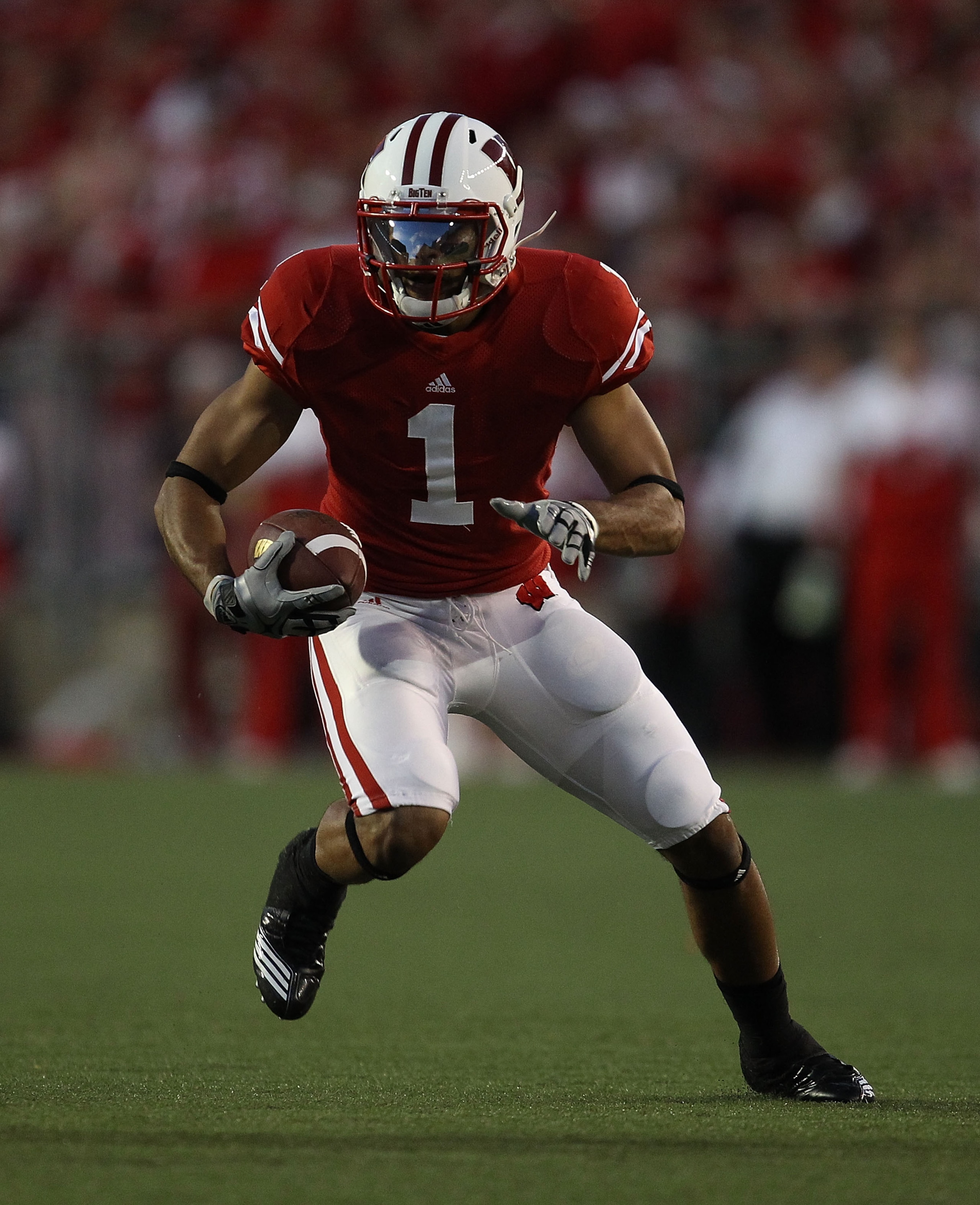 MADISON, WI - OCTOBER 16: Nick Toon #1 of the Wisconsin Badgers runs after a catch against the Ohio State Buckeyes at Camp Randall Stadium on October 16, 2010 in Madison, Wisconsin. Wisconsin defeated Ohio State 31-18. (Photo by Jonathan Daniel/Getty Imag MADISON, WI - OCTOBER 16: Nick Toon #1 of the Wisconsin Badgers runs after a catch against the Ohio State Buckeyes at Camp Randall Stadium on October 16, 2010 in Madison, Wisconsin. Wisconsin defeated Ohio State 31-18. (Photo by Jonathan Daniel/Getty Imag