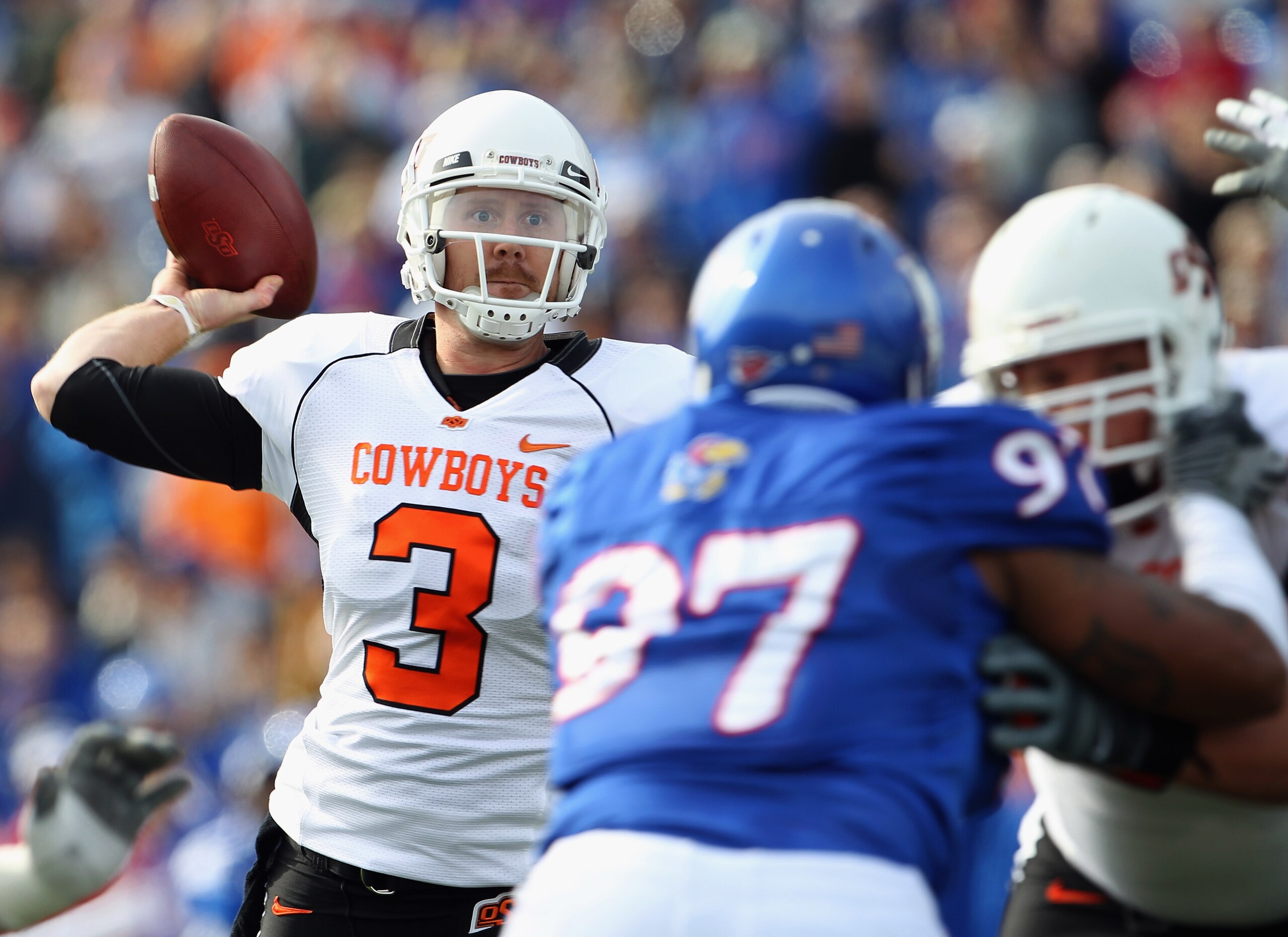 LAWRENCE, KS - NOVEMBER 20: Quarterback Brandon Weeden #3 of the Oklahoma State Cowboys passes during the game against the Kansas Jayhawks on November 20, 2010 at Memorial Stadium in Lawrence, Kansas. (Photo by Jamie Squire/Getty Images) LAWRENCE, KS - NOVEMBER 20: Quarterback Brandon Weeden #3 of the Oklahoma State Cowboys passes during the game against the Kansas Jayhawks on November 20, 2010 at Memorial Stadium in Lawrence, Kansas. (Photo by Jamie Squire/Getty Images)