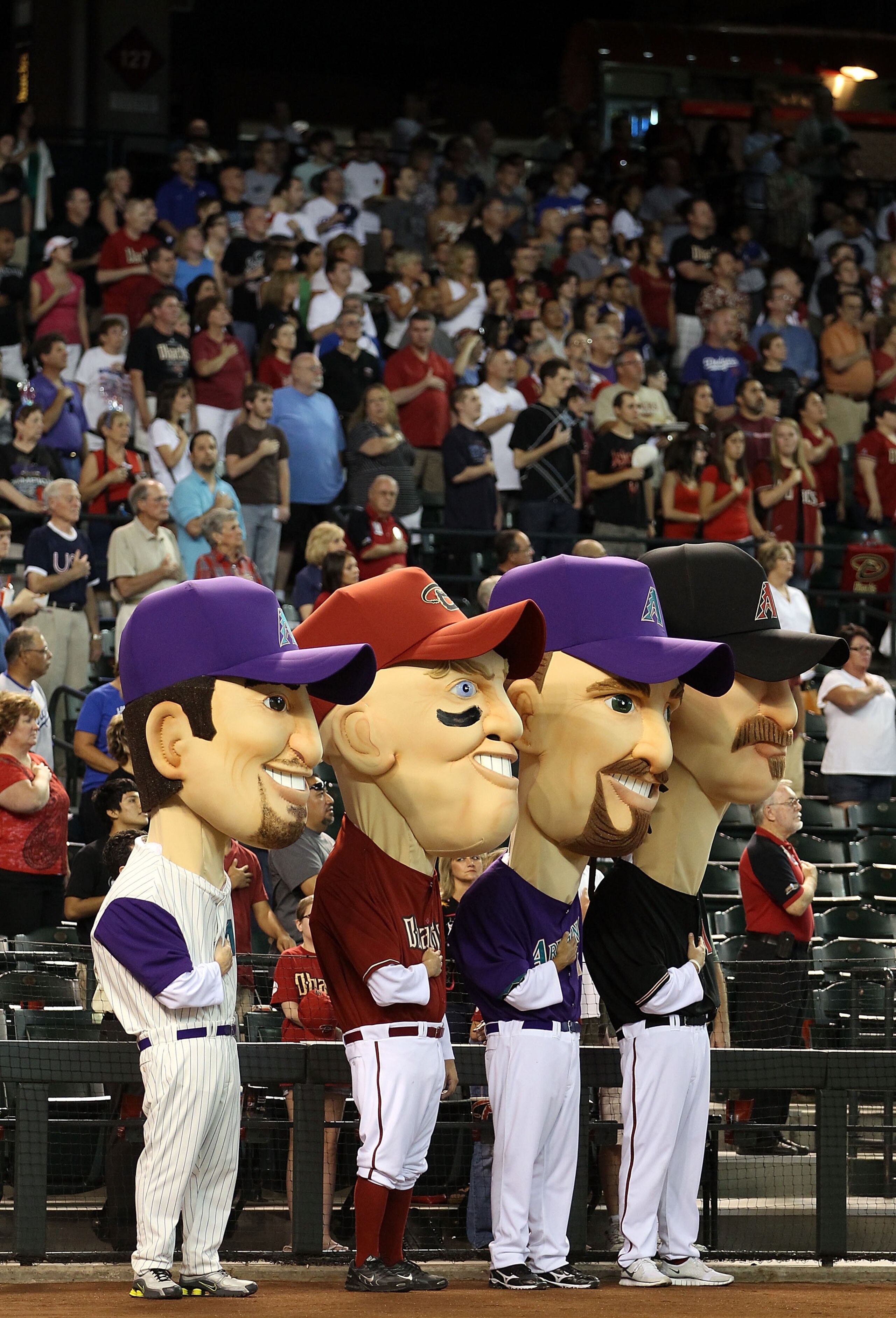 PHOENIX - JULY 03: The Arizona Diamondbacks 'legends' (L-R) Luis Gonzalez, Matt Williams, Mark Grace and Randy Johnson stand attended for the National Anthem before the Major League Baseball game against the Los Angeles Dodgers at Chase Field on July 3, 2