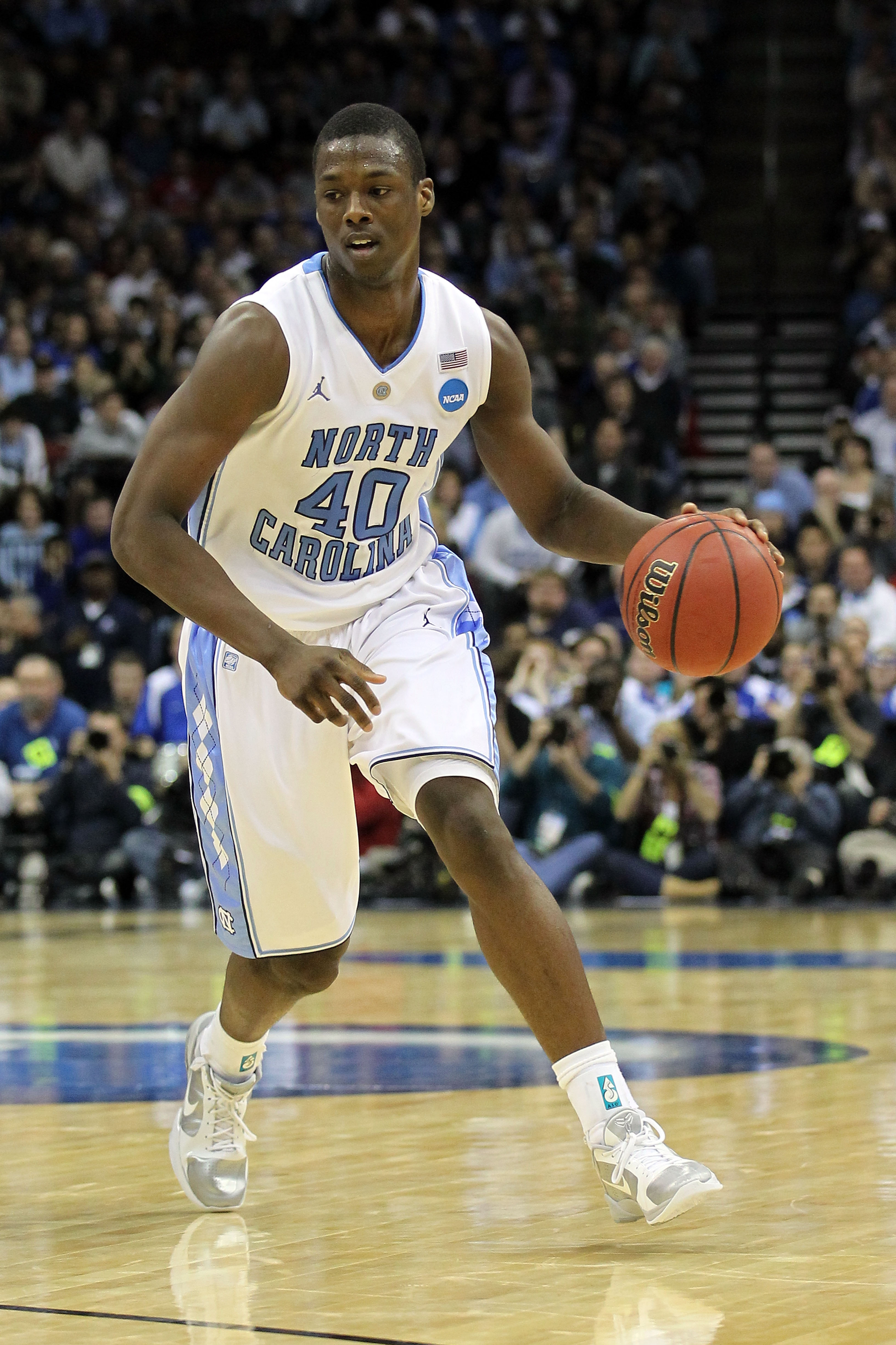 NEWARK, NJ - MARCH 27:  Harrison Barnes #40 of the North Carolina Tar Heels dribbles the ball during the second half of the game against the Kentucky Wildcats in the east regional final of the 2011 NCAA men's basketball tournament at Prudential Center on