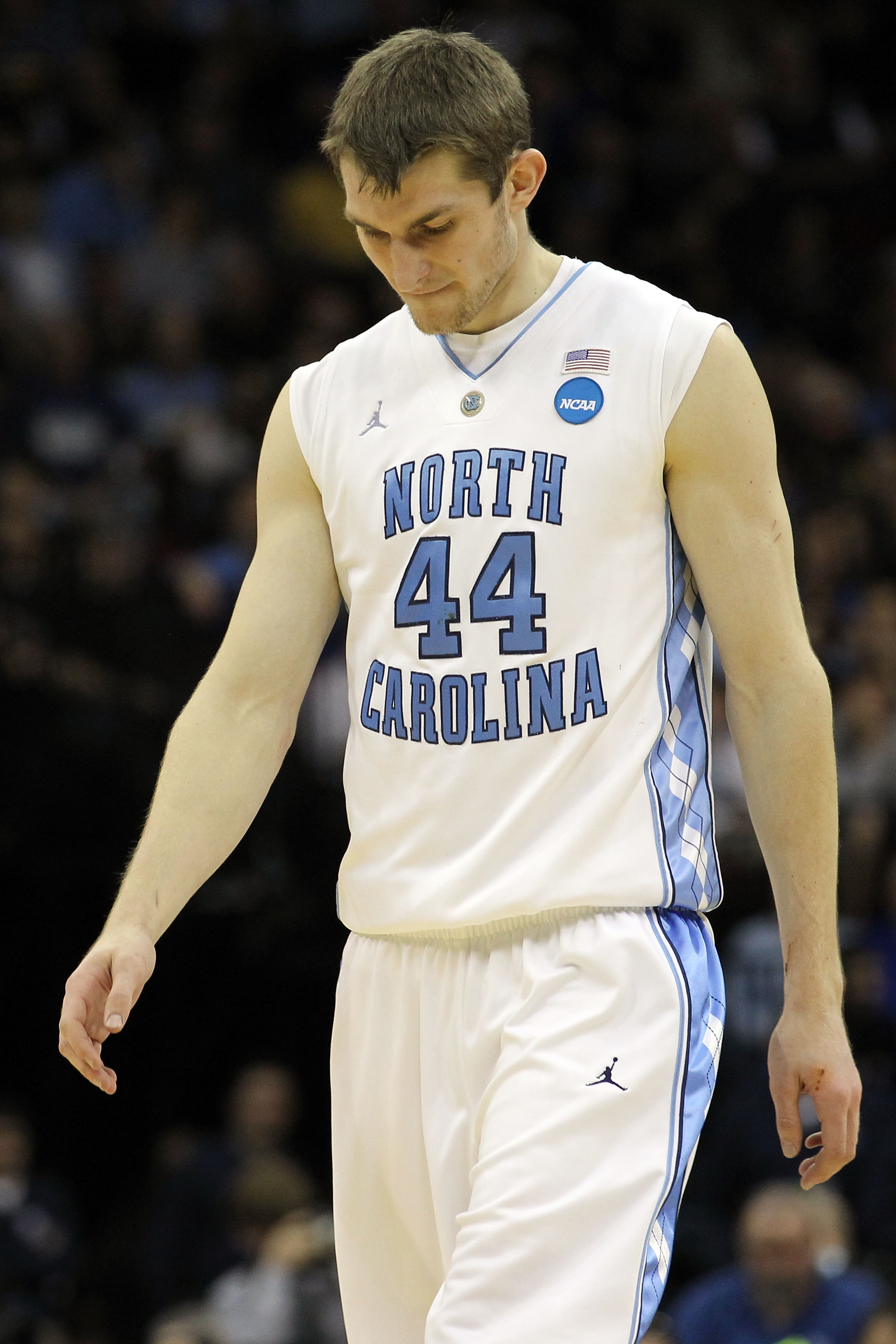 NEWARK, NJ - MARCH 27:  Tyler Zeller #44 of the North Carolina Tar Heels walks on court during the first half of the game against the Kentucky Wildcats in the east regional final of the 2011 NCAA men's basketball tournament at Prudential Center on March 2