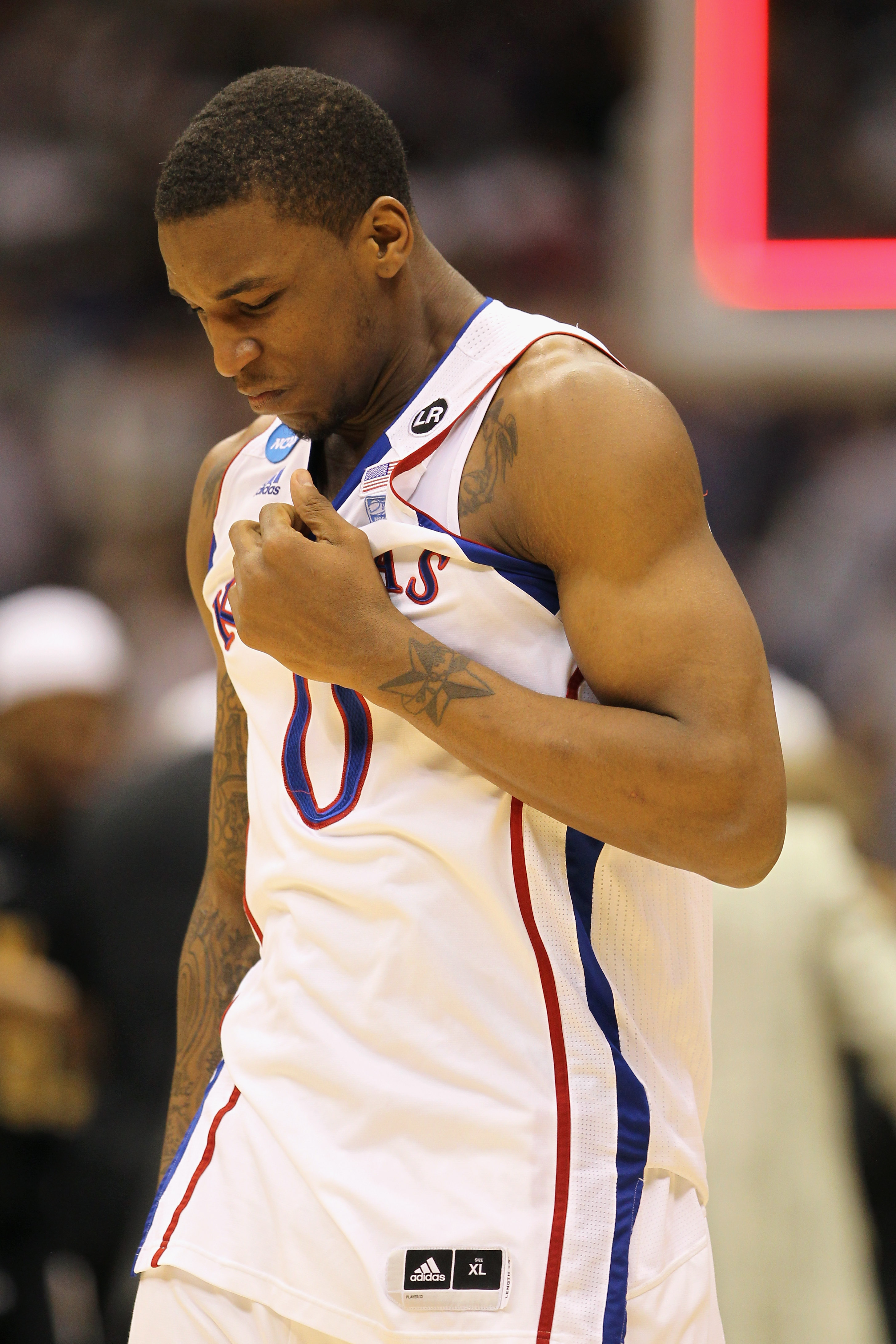 SAN ANTONIO, TX - MARCH 27:  Thomas Robinson #0 of the Kansas Jayhawks reacts after the southwest regional final of the 2011 NCAA men's basketball tournament against the Virginia Commonwealth Rams at the Alamodome on March 27, 2011 in San Antonio, Texas.