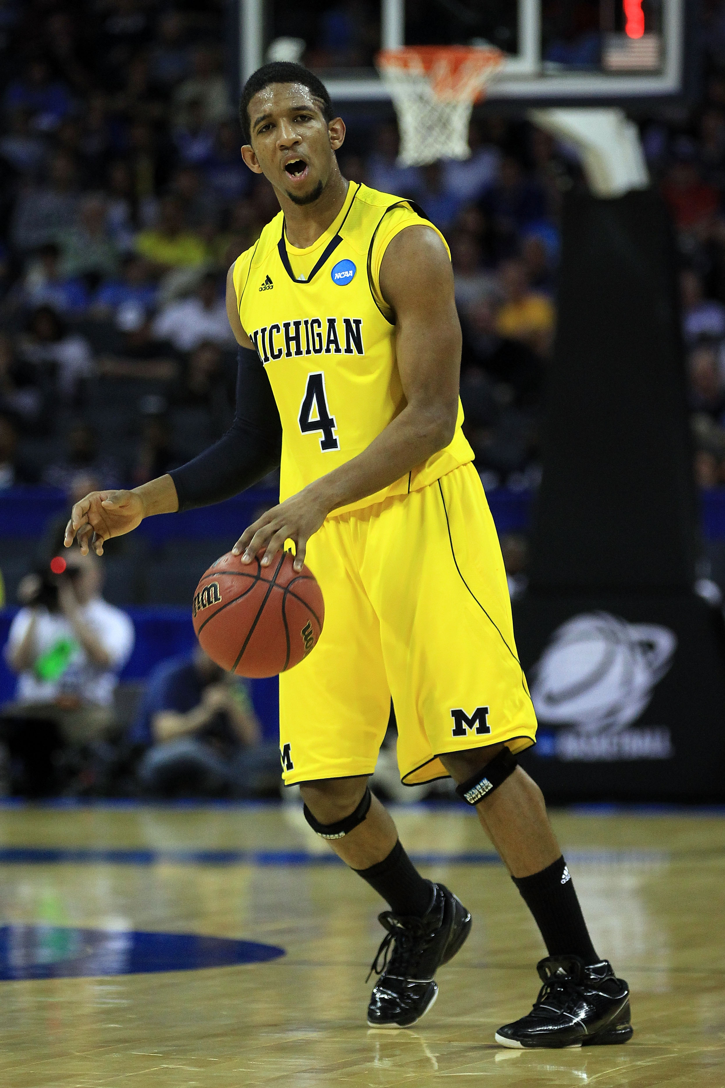 CHARLOTTE, NC - MARCH 20:  Darius Morris #4 of the Michigan Wolverines moves the ball while taking on the Duke Blue Devils during the third round of the 2011 NCAA men's basketball tournament at Time Warner Cable Arena on March 20, 2011 in Charlotte, North