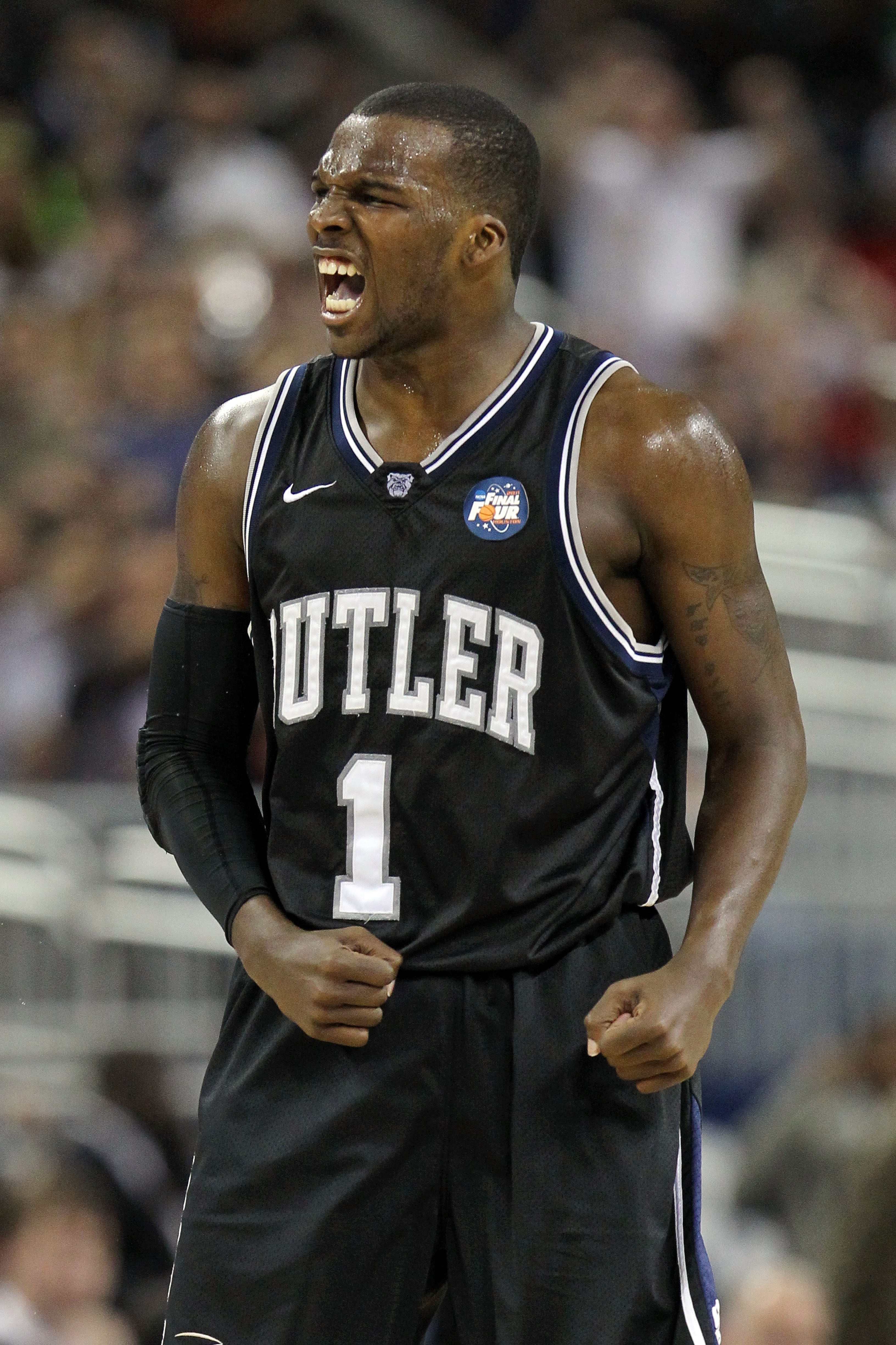 HOUSTON, TX - APRIL 04:  Shelvin Mack #1 of the Butler Bulldogs celebrate after a shot to end the first half against the Connecticut Huskies during the National Championship Game of the 2011 NCAA Division I Men's Basketball Tournament at Reliant Stadium o