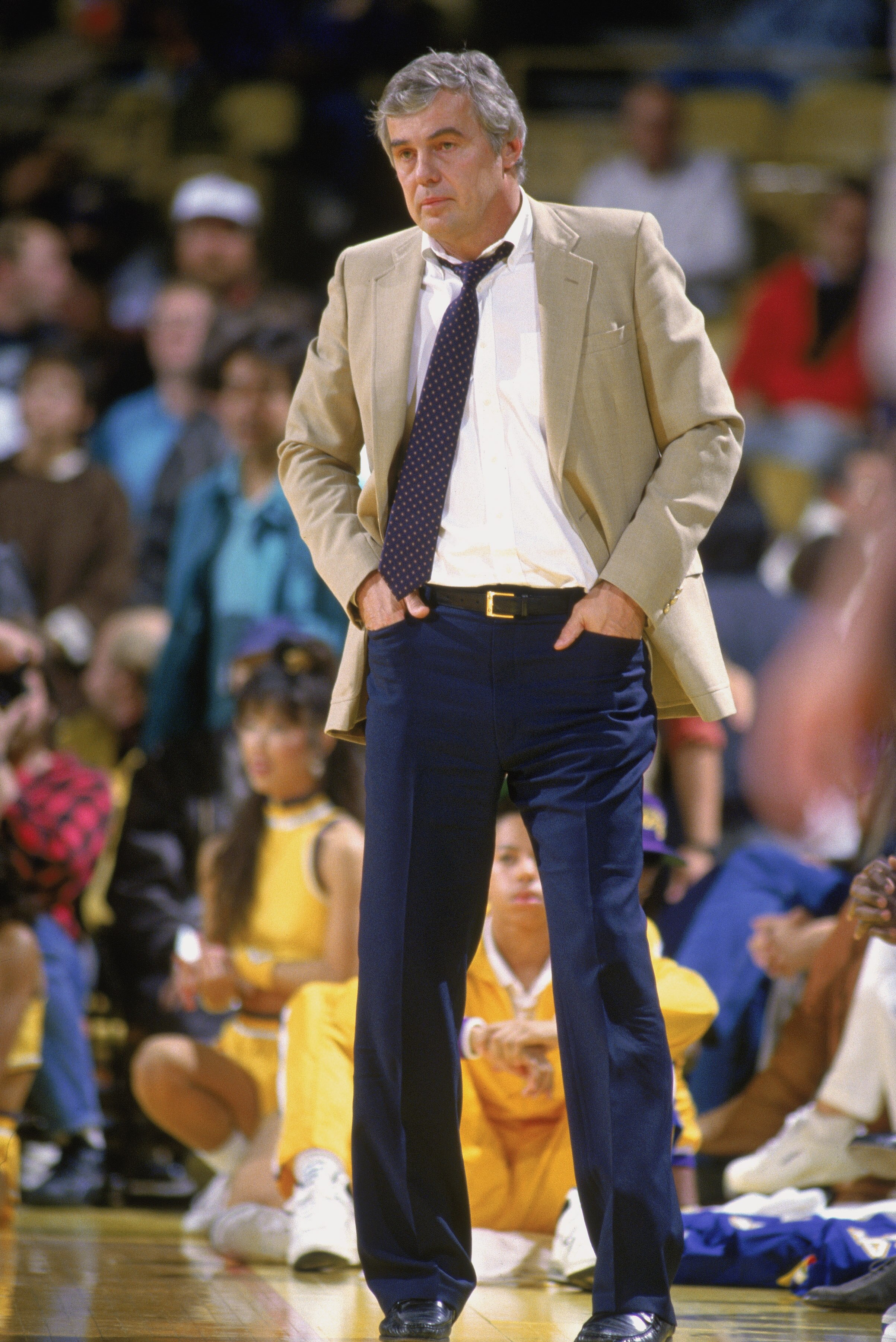 LOS ANGELES - 1988:  With hands in his pockets, head coach Doug Moe of the Denver Nuggets stands on the sideline during the NBA game against the Los Angeles Lakers at the Great Western Forum in Los Angeles, California in 1988. NOTE TO USER: User expressly