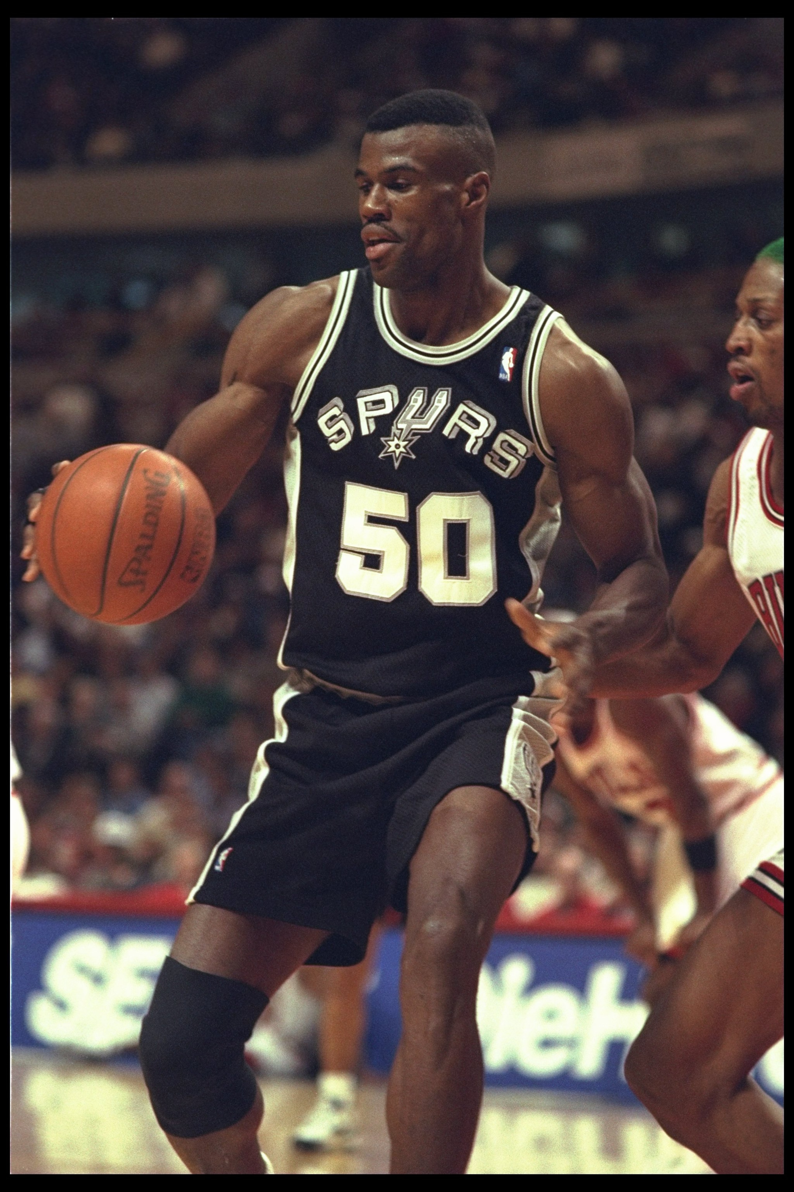 8 Dec 1995:  Center David Robinson of the San Antonio Spurs moves the ball against the Chicago Bulls during a game played at the United Center in Chicago, Illinois.  The Bulls won the game, 106-87. Mandatory Credit: Jonathan Daniel/Allsport