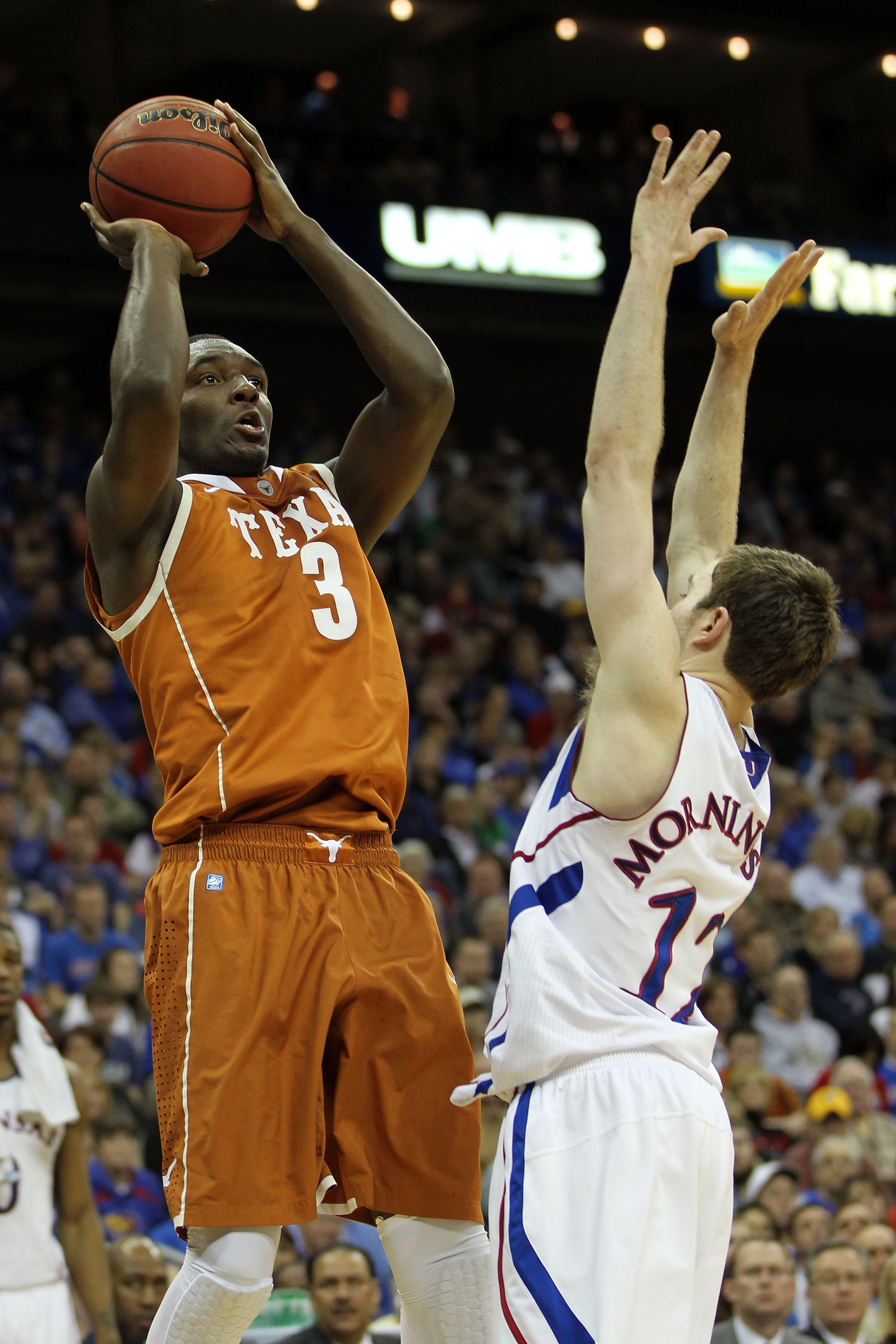 KANSAS CITY, MO - MARCH 12: Jordan Hamilton #3 of the Texas Longhorns goes up for a shot against Brady Morningstar #12 of the Kansas Jayhawks during the 2011 Phillips 66 Big 12 Men's Basketball Tournament championship game at Sprint Center on March 12, 2 KANSAS CITY, MO - MARCH 12: Jordan Hamilton #3 of the Texas Longhorns goes up for a shot against Brady Morningstar #12 of the Kansas Jayhawks during the 2011 Phillips 66 Big 12 Men's Basketball Tournament championship game at Sprint Center on March 12, 2