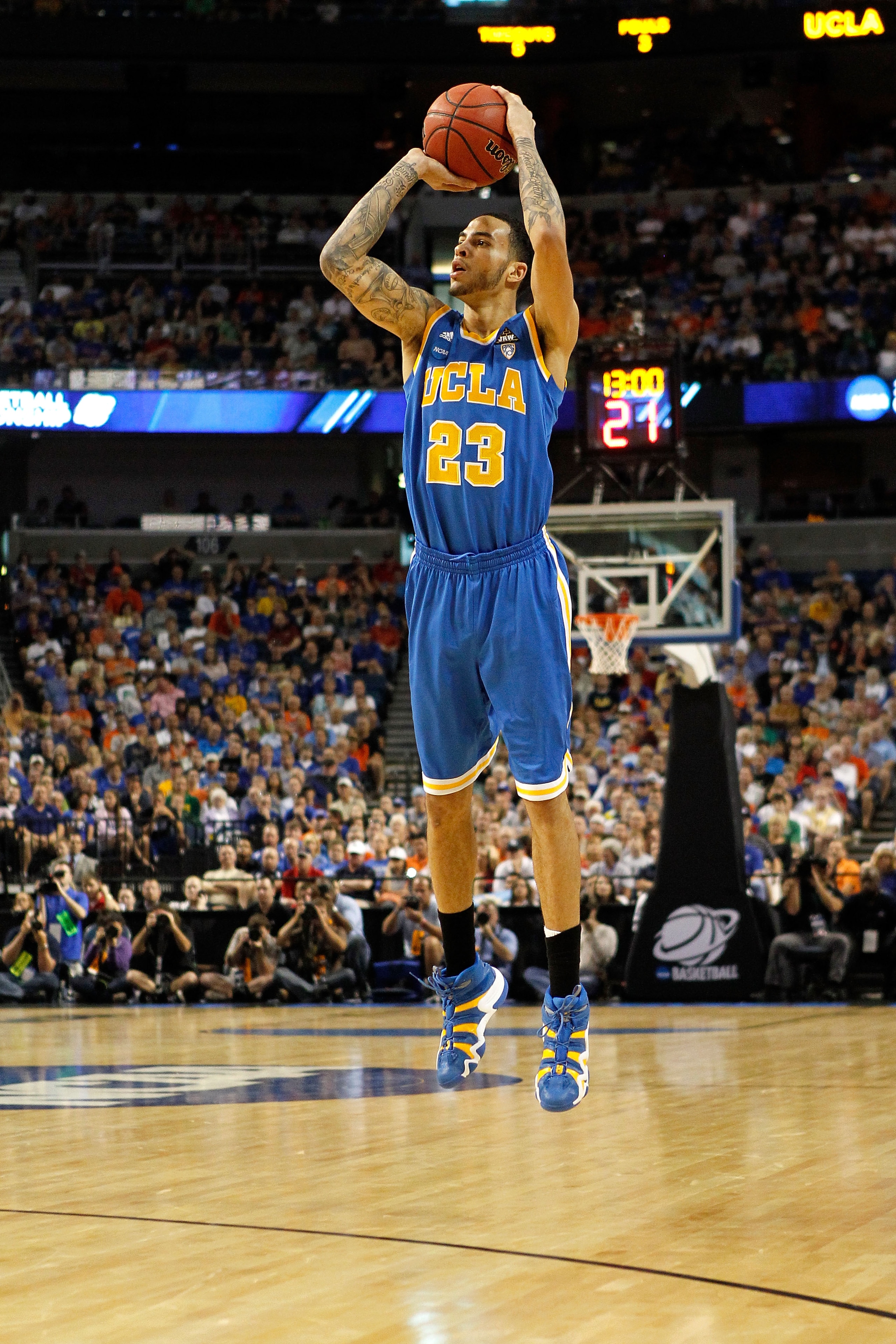 TAMPA, FL - MARCH 19: Tyler Honeycutt #23 of the UCLA Bruins attempts a shot agaisnt the Florida Gators during the third round of the 2011 NCAA men's basketball tournament at St. Pete Times Forum on March 19, 2011 in Tampa, Florida. Florida won 73-65. (P TAMPA, FL - MARCH 19: Tyler Honeycutt #23 of the UCLA Bruins attempts a shot agaisnt the Florida Gators during the third round of the 2011 NCAA men's basketball tournament at St. Pete Times Forum on March 19, 2011 in Tampa, Florida. Florida won 73-65. (P