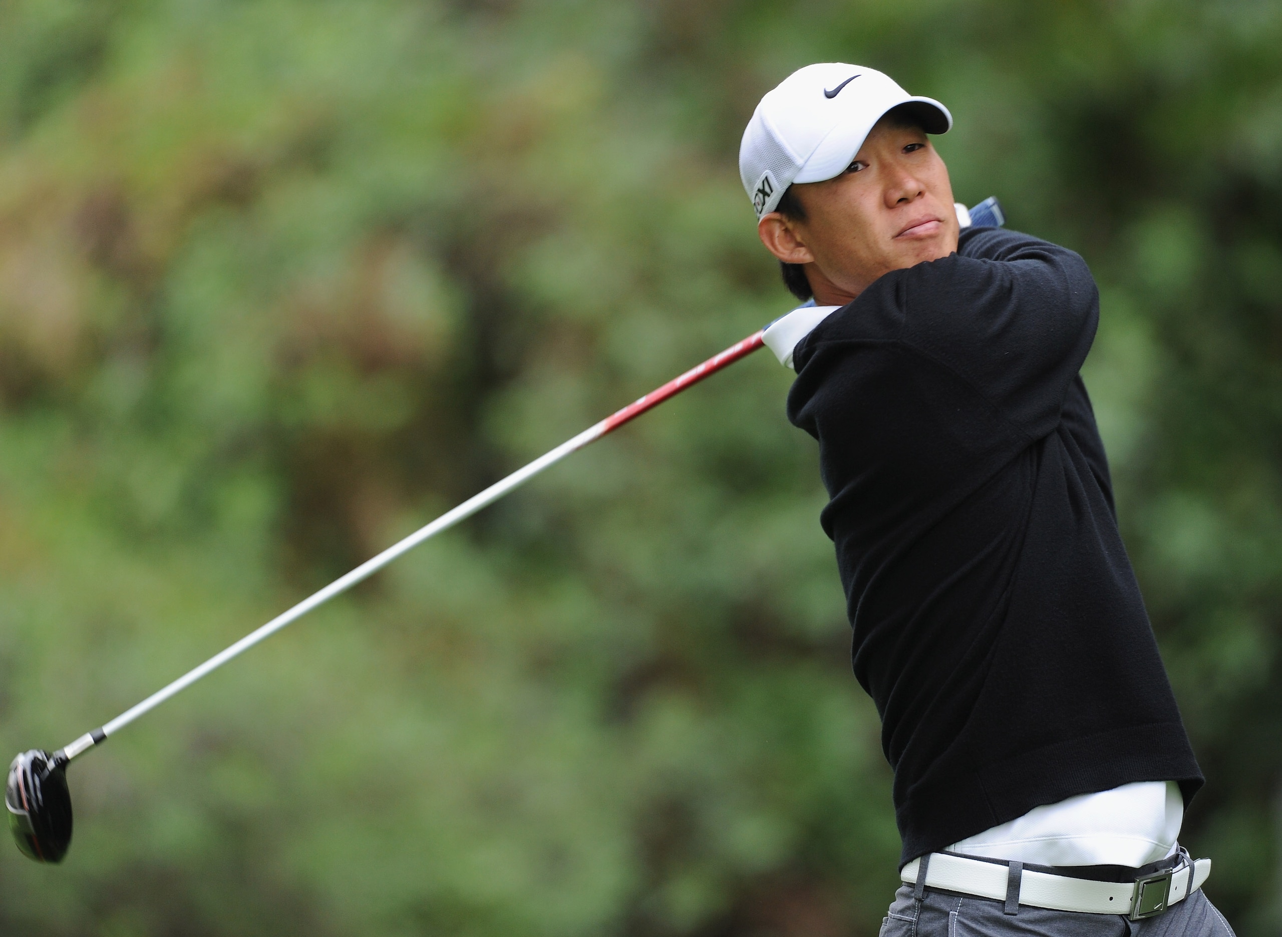 PACIFIC PALISADES, CA - FEBRUARY 18:  Anthony Kim plays his tee shot on the 12th hole during the second round of the Northern Trust Open at Riviera Country Club on February 18, 2011 in Pacific Palisades, California.  (Photo by Stuart Franklin/Getty Images