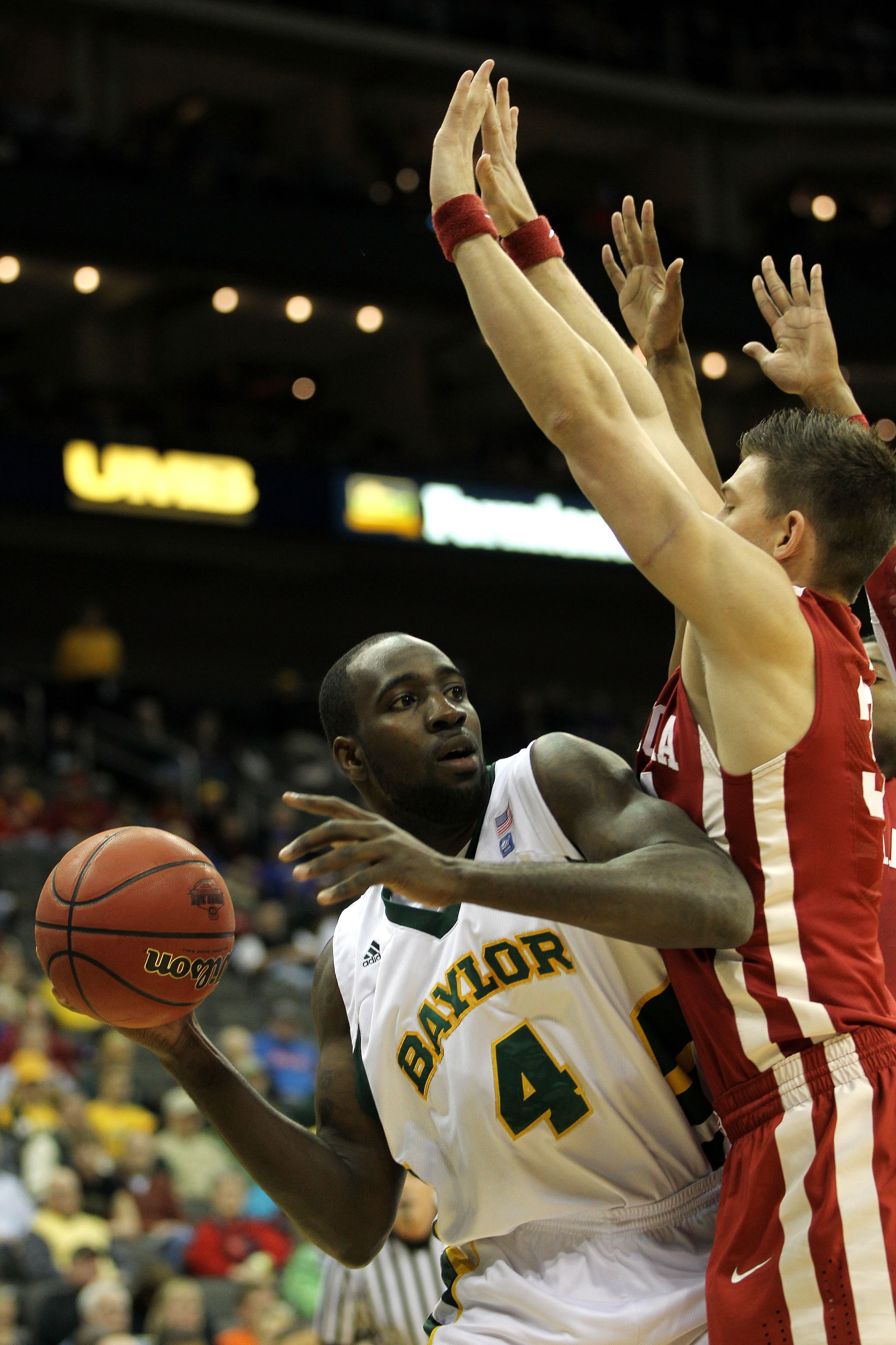 KANSAS CITY, MO - MARCH 09: Quincy Acy #4 of the Baylor Bears looks to pass the ball against the Oklahoma Sooners during their game in the first round of the 2011 Phillips 66 Big 12 Men's Basketball Tournament at Sprint Center on March 9, 2011 in Kansas KANSAS CITY, MO - MARCH 09: Quincy Acy #4 of the Baylor Bears looks to pass the ball against the Oklahoma Sooners during their game in the first round of the 2011 Phillips 66 Big 12 Men's Basketball Tournament at Sprint Center on March 9, 2011 in Kansas