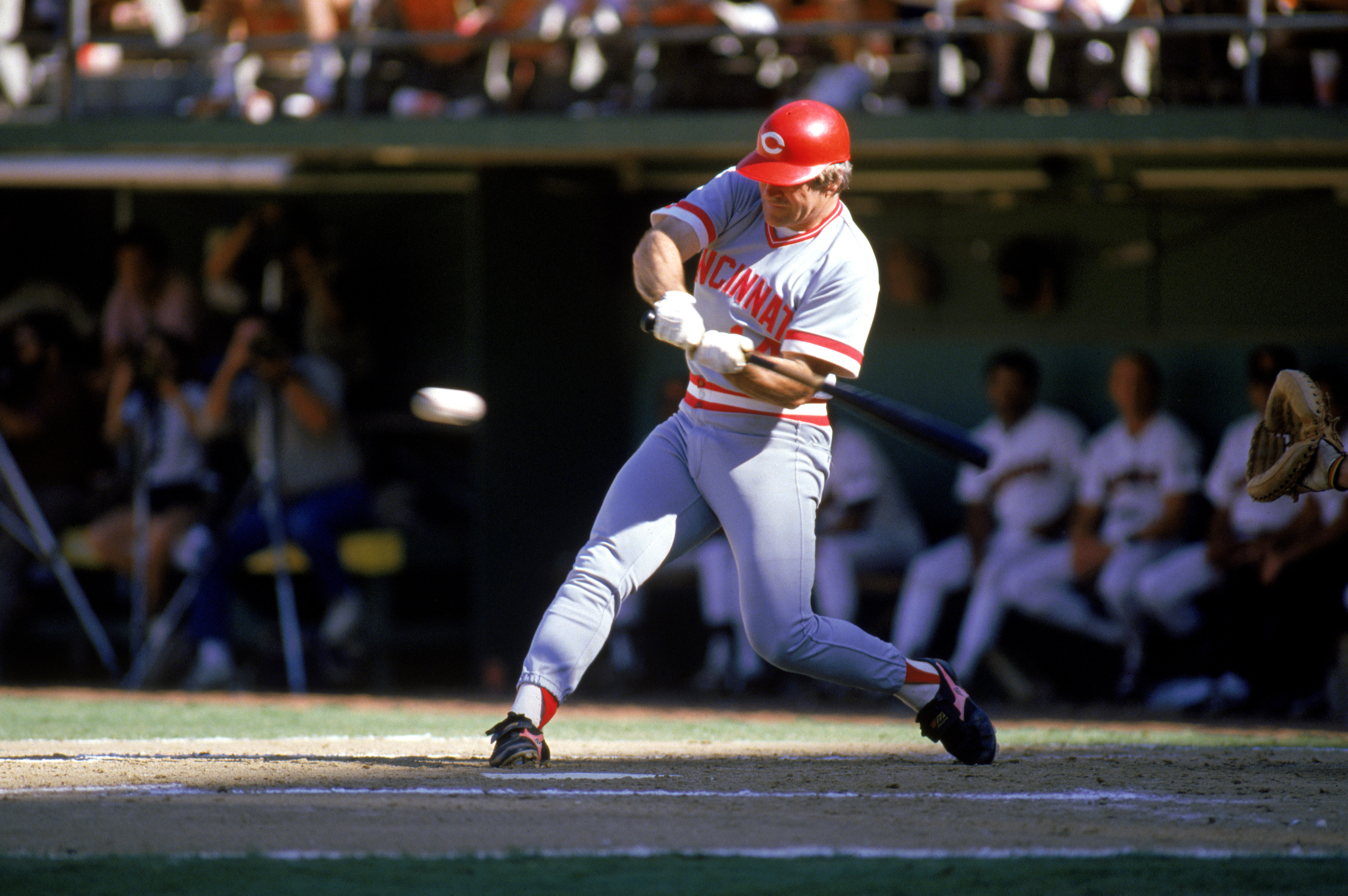 1985:  Pete Rose of the Cincinnati Reds swings at the pitch during a MLB game in the 1985 season. ( Photo by: Stephen Dunn/Getty Images)