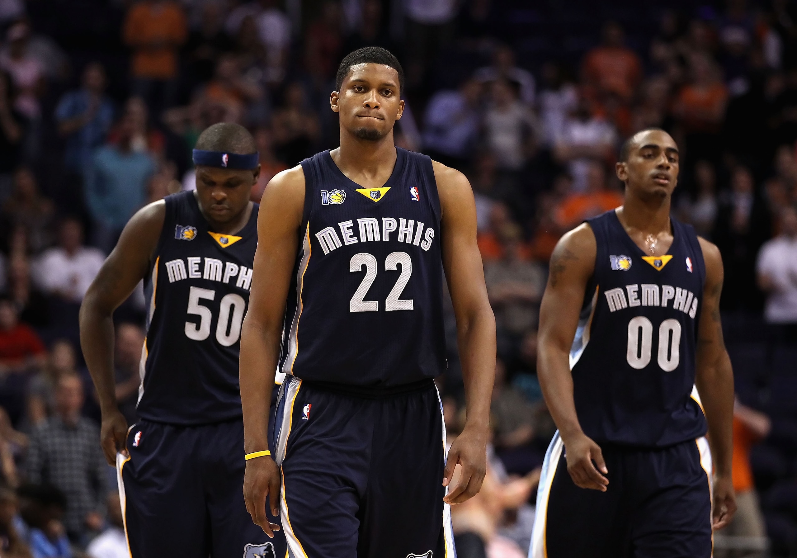 PHOENIX - NOVEMBER 05:  (L-R) Zach Randolph #50, Rudy Gay #22 and Darrell Arthur #00 of the Memphis Grizzlies react in the final moments of the NBA game against the Phoenix Suns at US Airways Center on November 5, 2010 in Phoenix, Arizona. The Suns defeat