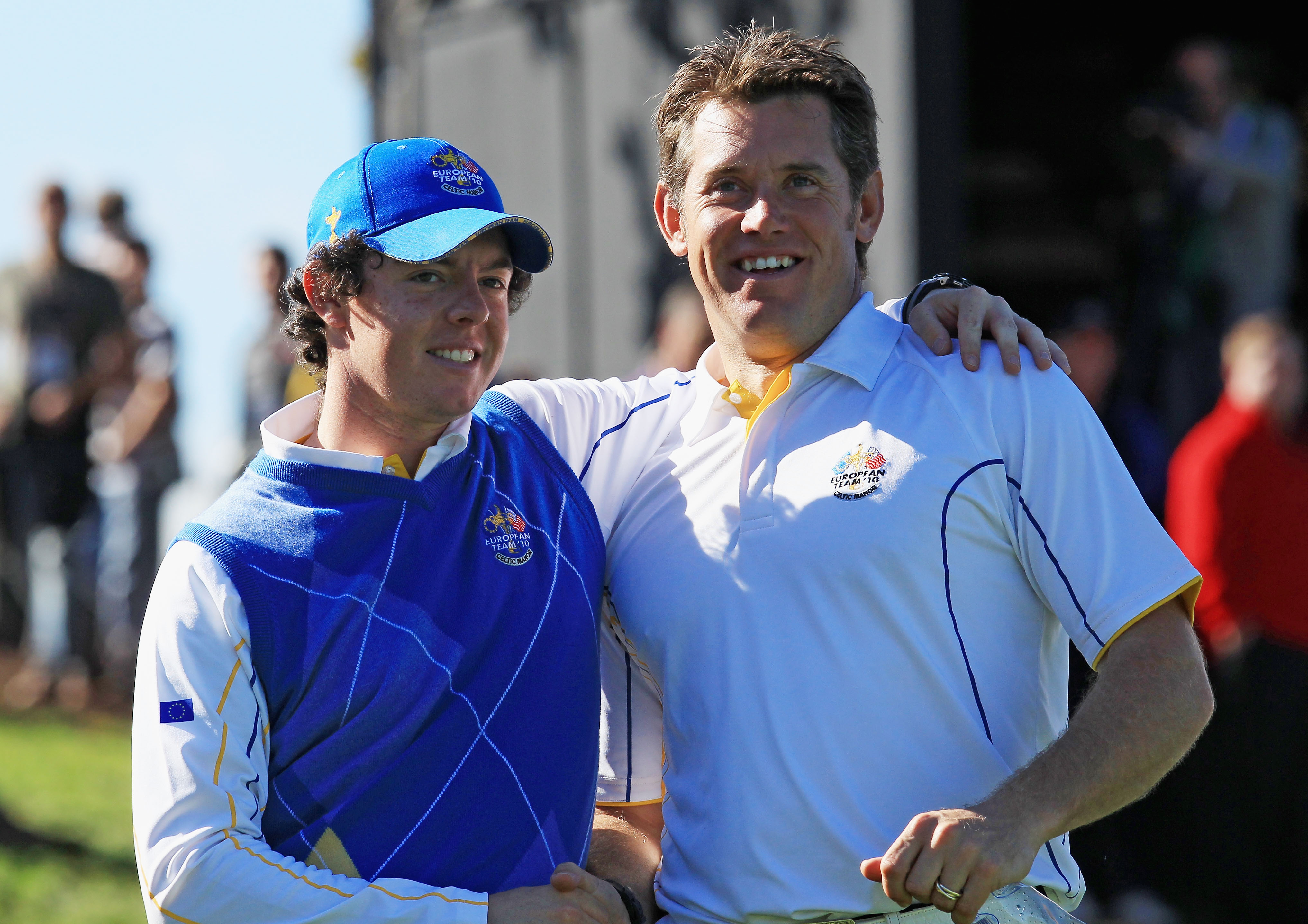 NEWPORT, WALES - OCTOBER 04:  Rory McIlroy of Europe embraces Lee Westwood on the 18th green after he halved his match in the singles matches during the 2010 Ryder Cup at the Celtic Manor Resort on October 4, 2010 in Newport, Wales.  (Photo by David Canno