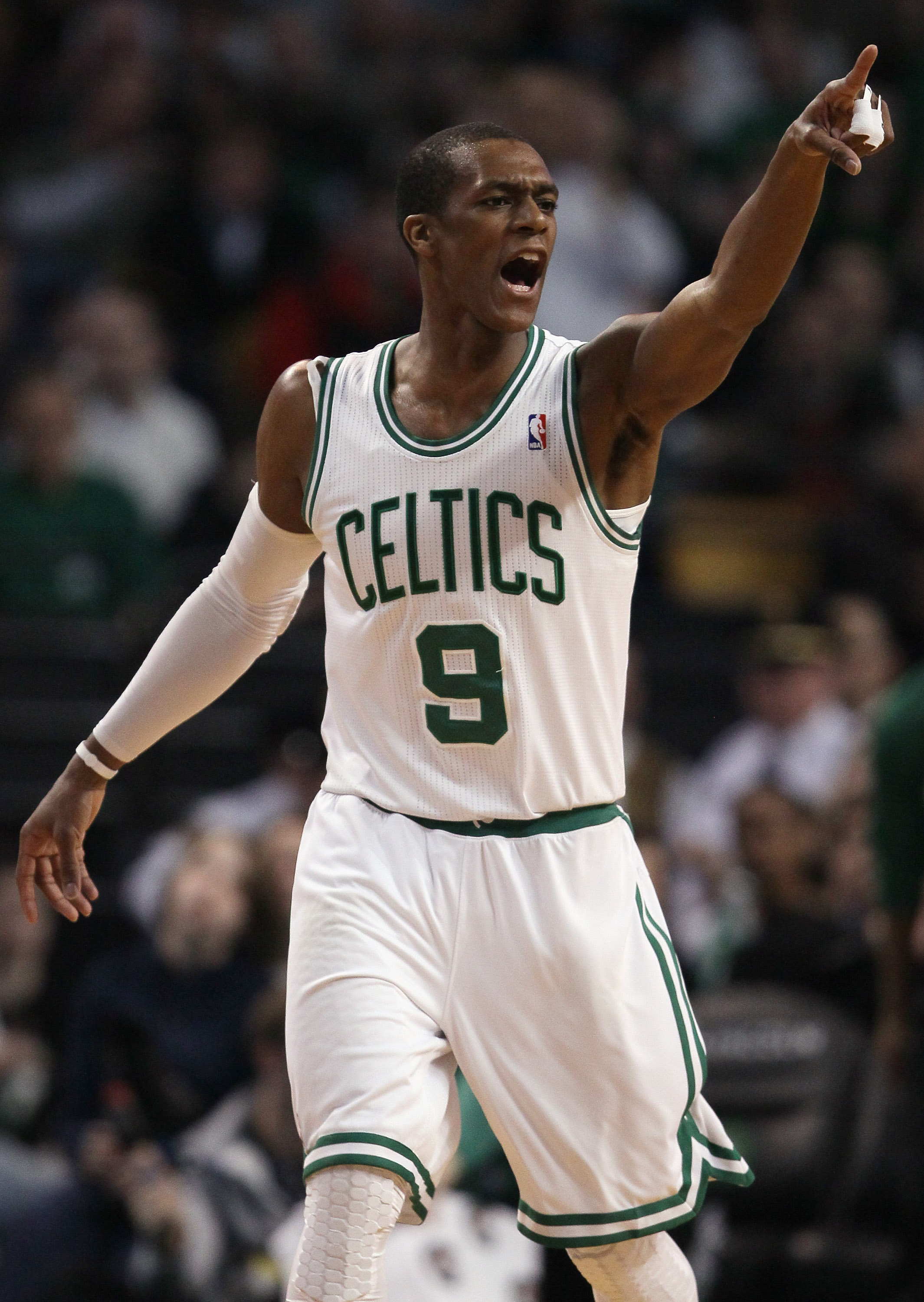 BOSTON, MA - MARCH 04:  Rajon Rondo #9 of the Boston Celtics calls out to his teammates in the first half against the Golden State Warriors on March 4, 2011 at the TD Garden in Boston, Massachusetts.  NOTE TO USER: User expressly acknowledges and agrees t