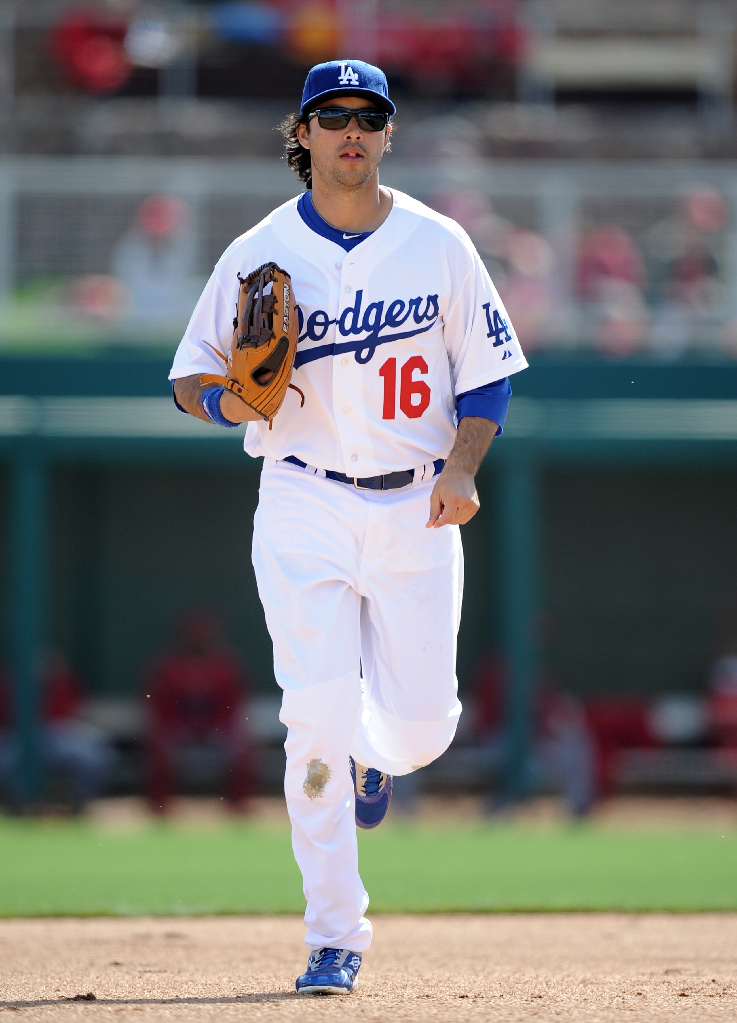 PHOENIX, AZ - FEBRUARY 27:  Andre Ethier #16 of the Los Angeles Dodgers leaves the field during spring training at Camelback Ranch on February 27, 2011 in Phoenix, Arizona.  (Photo by Harry How/Getty Images)