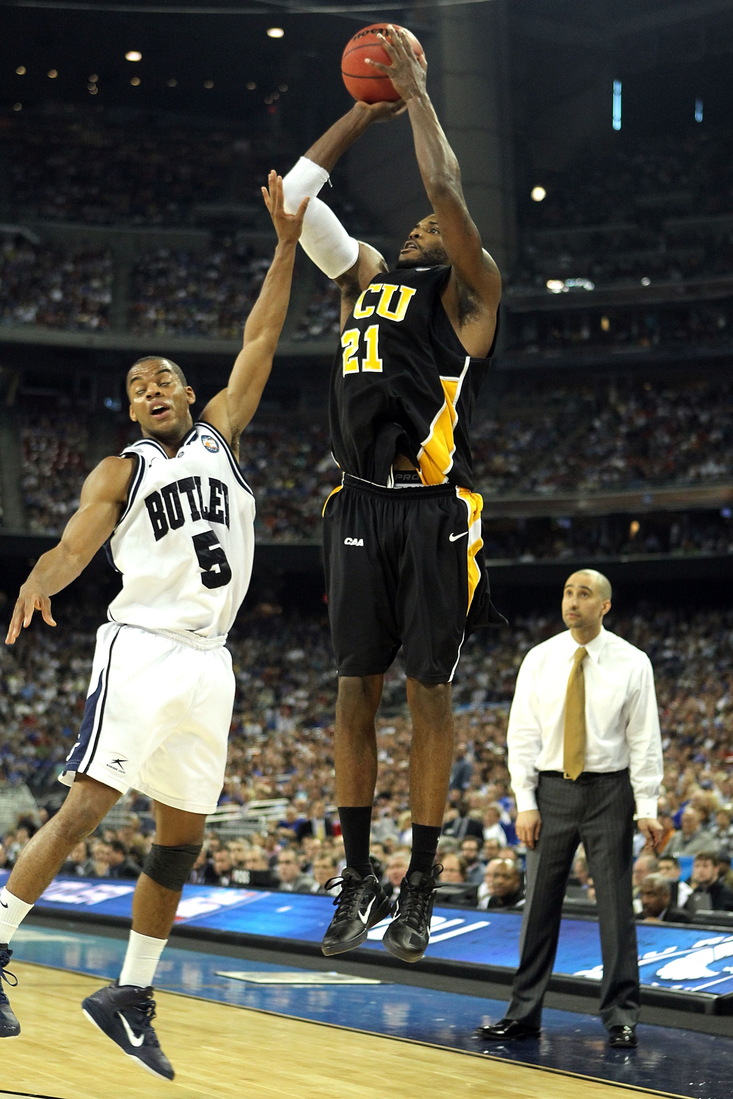 HOUSTON, TX - APRIL 02:  Jamie Skeen #21 of the Virginia Commonwealth Rams shoots the ball over Ronald Nored #5 of the Butler Bulldogs during the National Semifinal game of the 2011 NCAA Division I Men's Basketball Championship at Reliant Stadium on April
