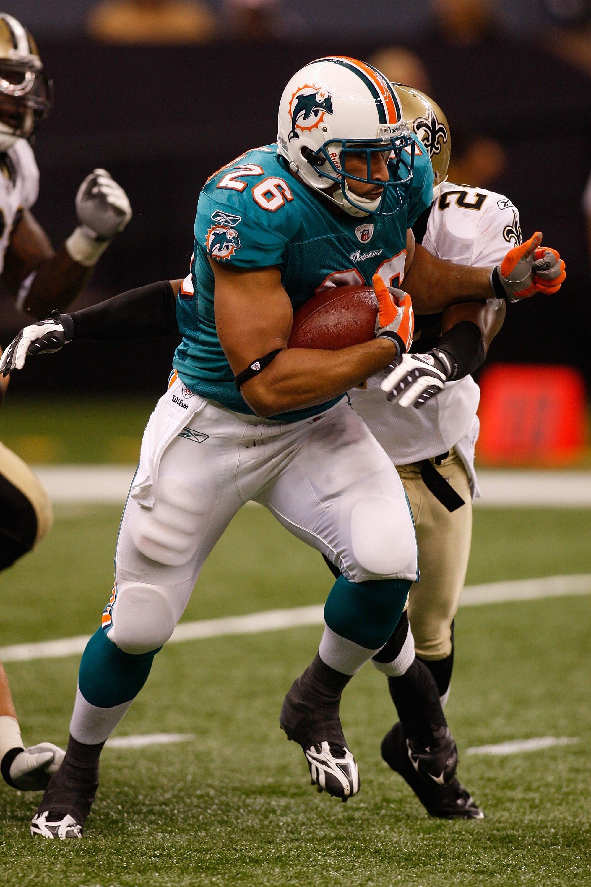 NEW ORLEANS - SEPTEMBER 03:  Lex Hilliard #26 of the Miami Dolphins during the game against the New Orleans Saints at the Louisiana Superdome on September 3, 2009 in New Orleans, Louisiana.  (Photo by Chris Graythen/Getty Images)