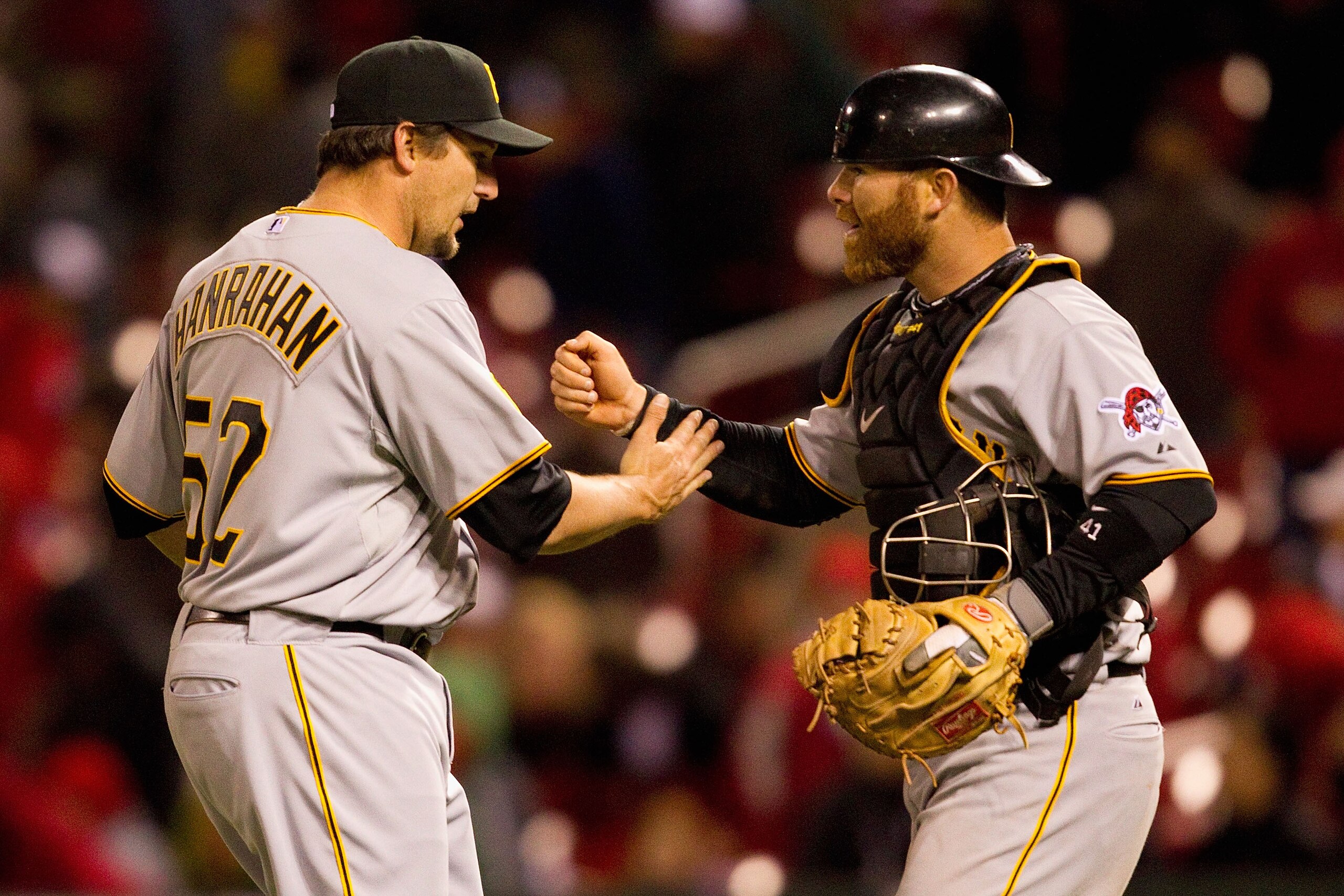 ST. LOUIS, MO - APRIL 4: Reliever Joel Hanrahan #52 and Ryan Doumit #41 both of the Pittsburgh Pirates congratulate each other after beating the St. Louis Cardinals at Busch Stadium on April 4, 2011 in St. Louis, Missouri.  (Photo by Dilip Vishwanat/Getty