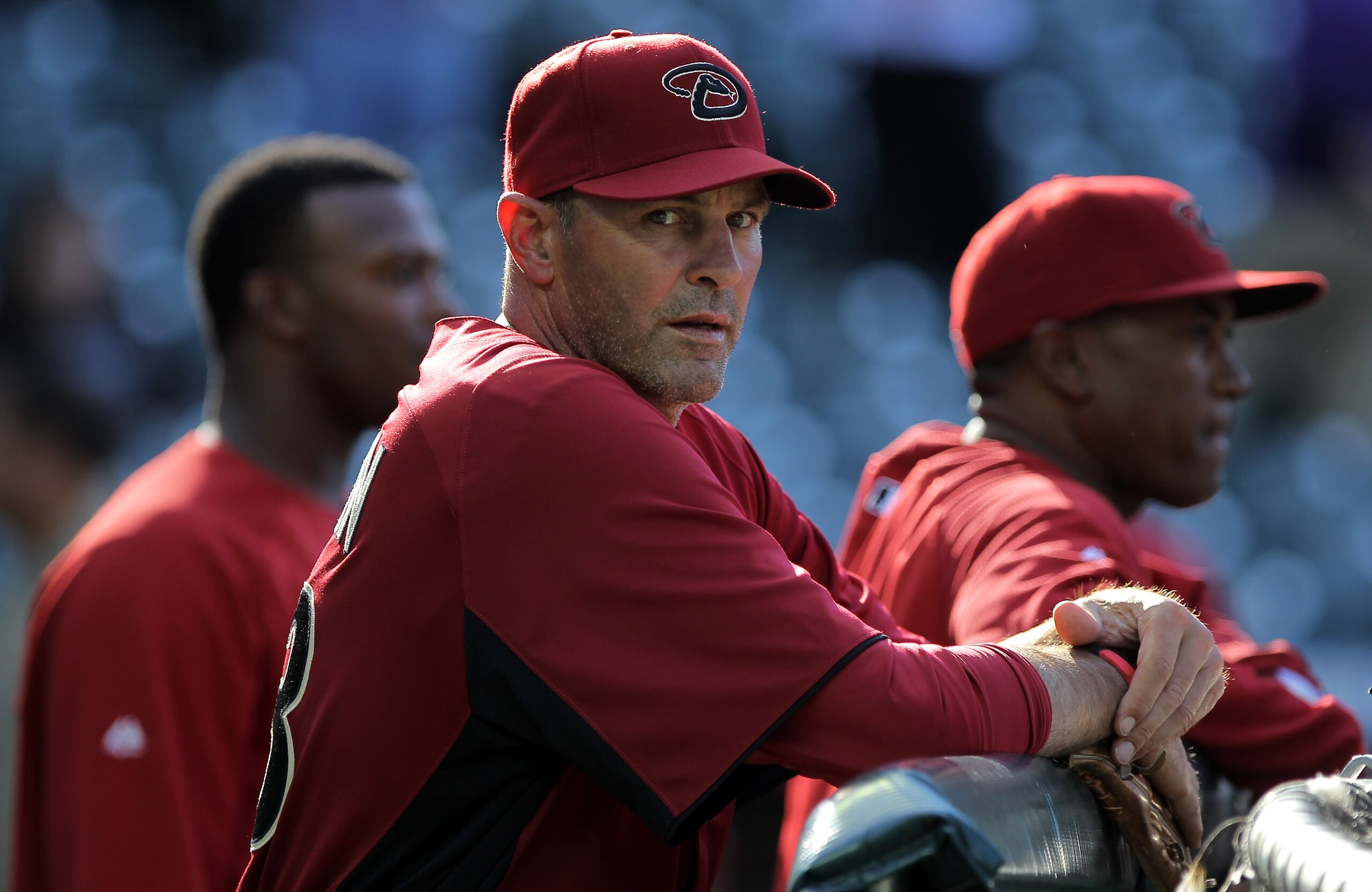 DENVER, CO - APRIL 02:  Manager Kirk Gibson #23 of the Arizona Diamondbacks watches his team as they take batting practice prior to facing the Colorado Rockies at Coors Field on April 2, 2011 in Denver, Colorado. The Rockies defeated the Diamondbacks 3-1.