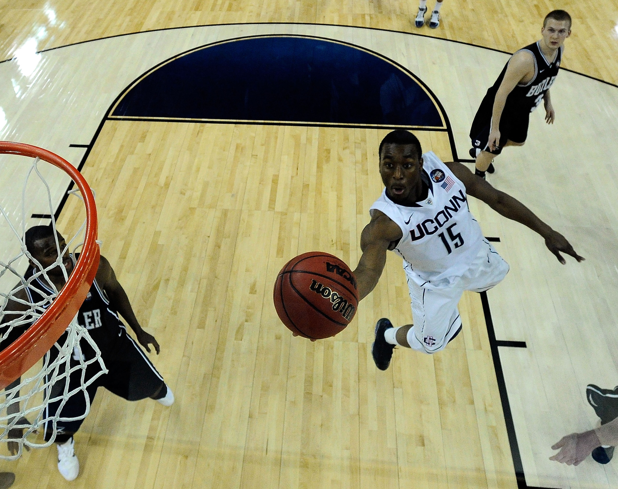 HOUSTON, TX - APRIL 04:  Kemba Walker #15 of the Connecticut Huskies goes to the basket against the Butler Bulldogs during the National Championship Game of the 2011 NCAA Division I Men's Basketball Tournament at Reliant Stadium on April 4, 2011 in Housto