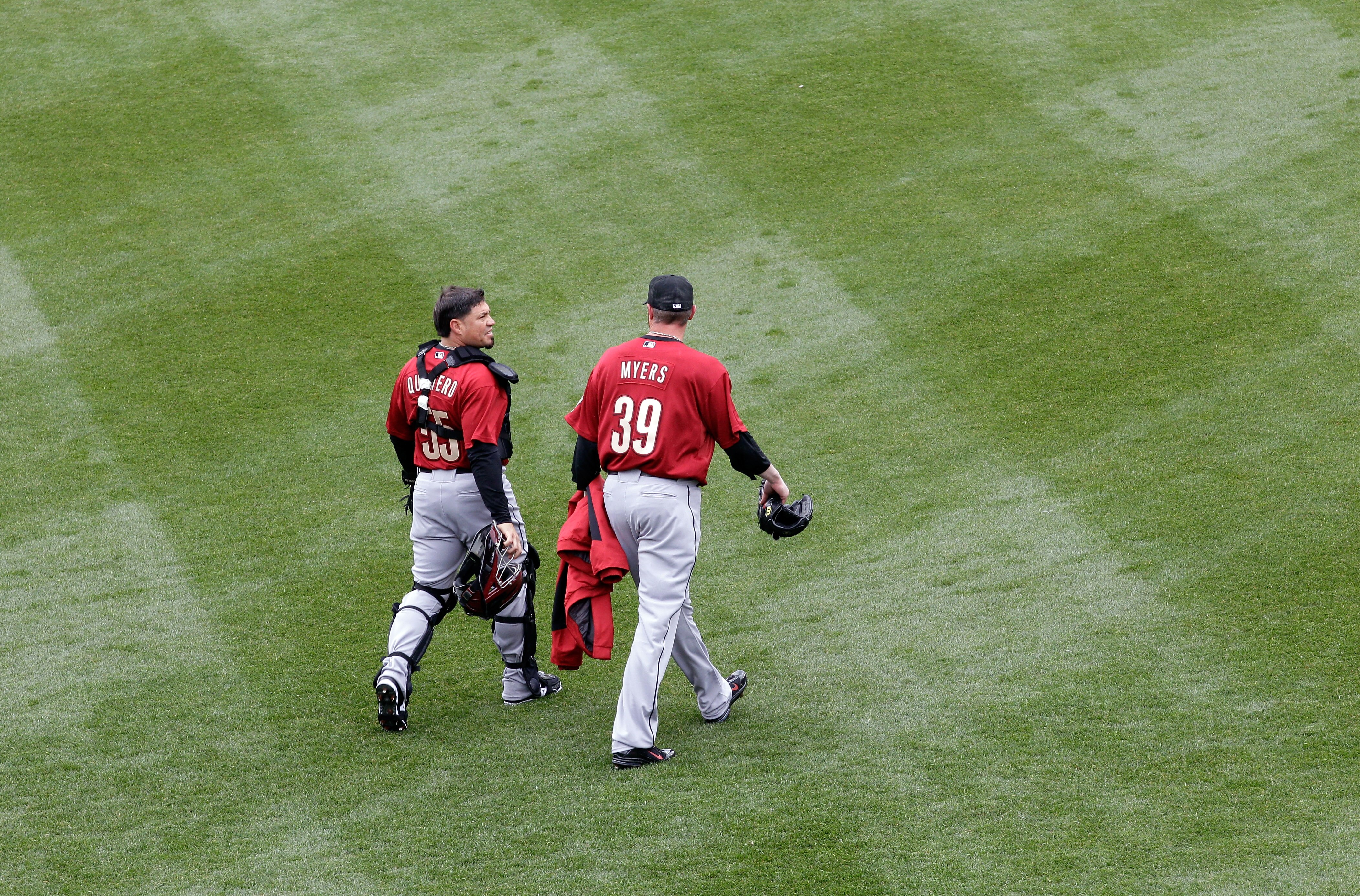 PHILADELPHIA, PA - APRIL 01: Catcher Humberto Quintero #55 of the Houston Astros and starting pitcher Brett Myers #39 walk in from the outfield during opening day against the Philadelphia Phillies at Citizens Bank Park on April 1, 2011 in Philadelphia, Pe