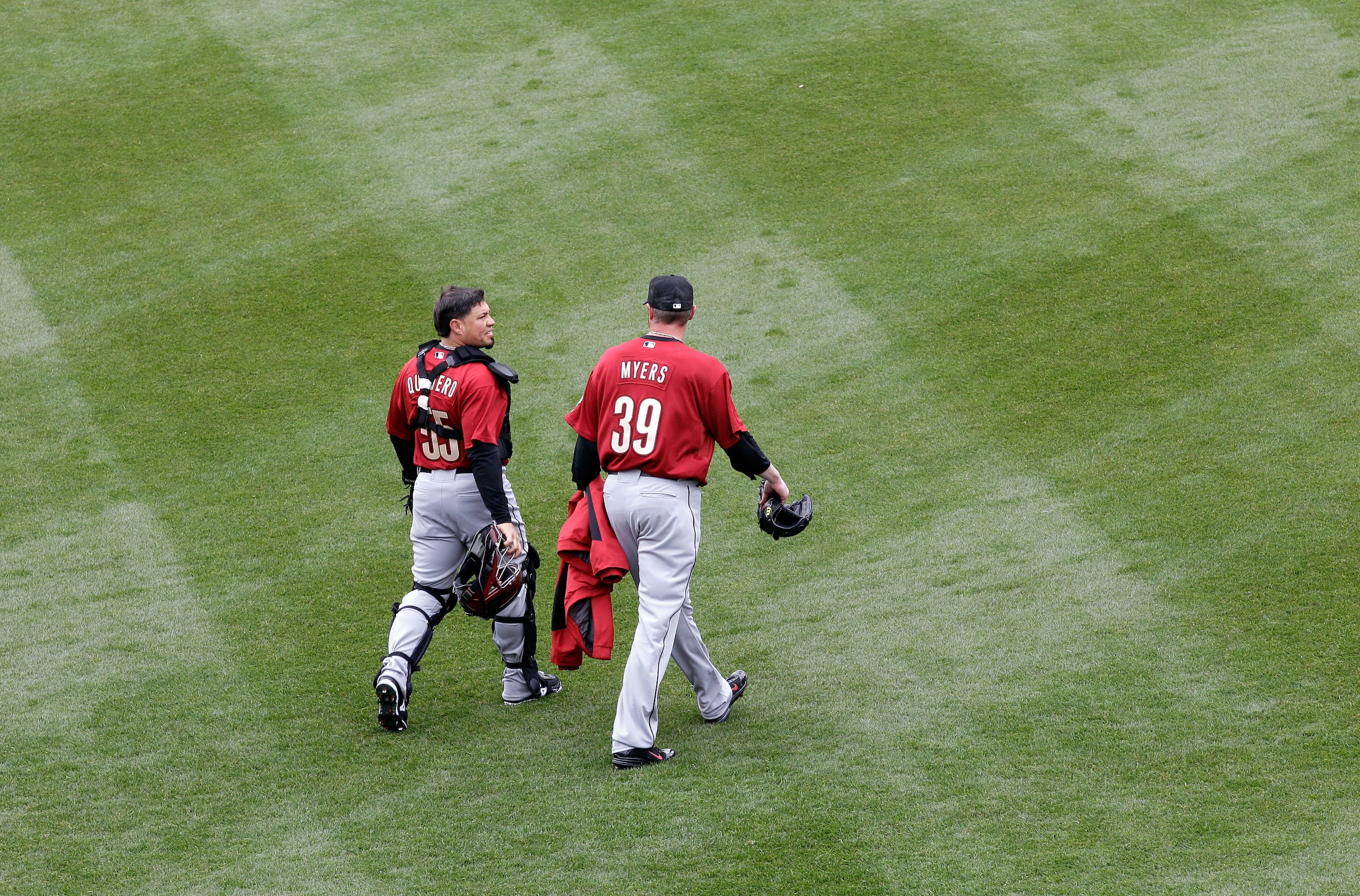 PHILADELPHIA, PA - APRIL 01: Catcher Humberto Quintero #55 of the Houston Astros and starting pitcher Brett Myers #39 walk in from the outfield during opening day against the Philadelphia Phillies at Citizens Bank Park on April 1, 2011 in Philadelphia, Pe