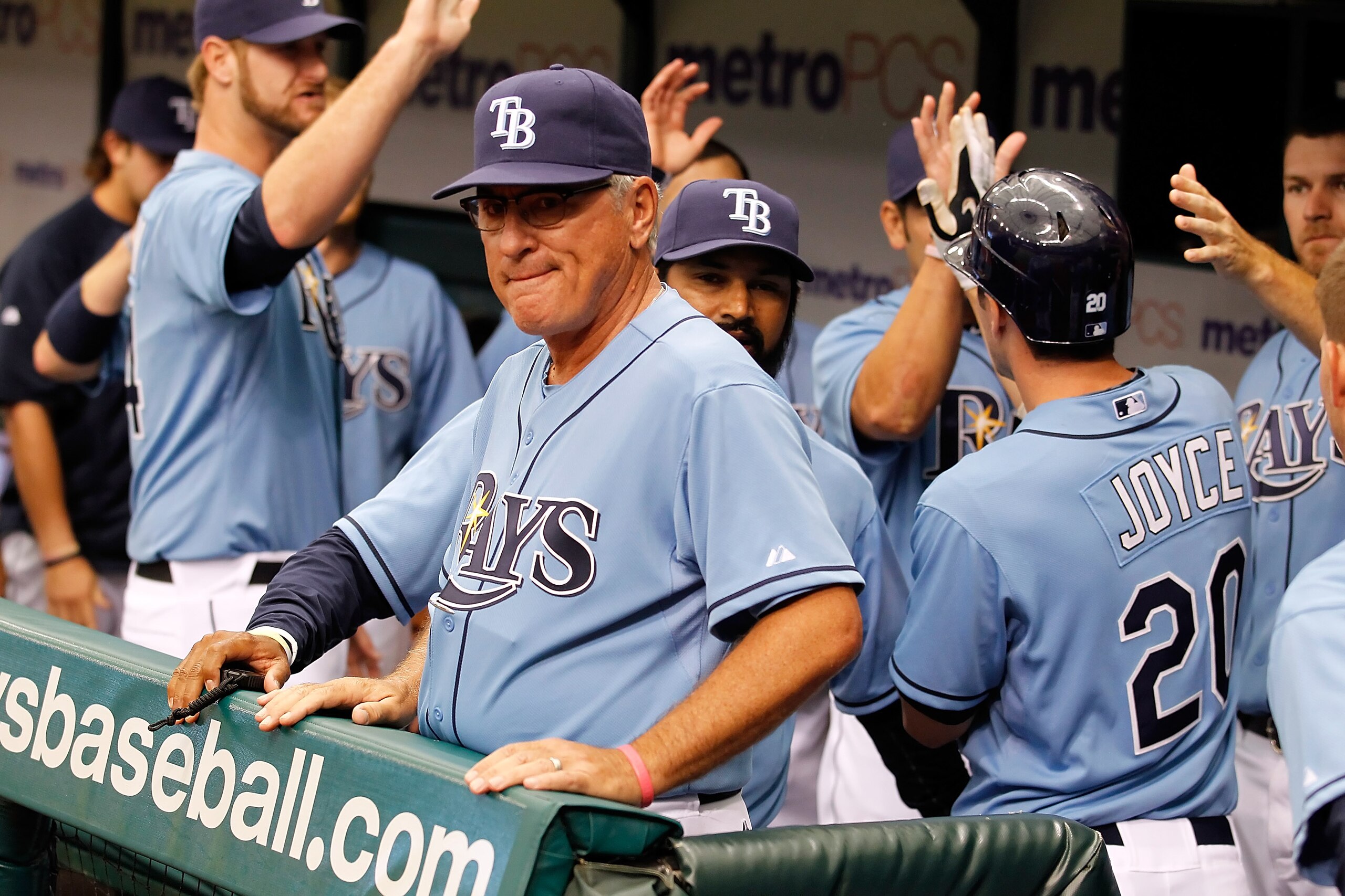 ST. PETERSBURG, FL - APRIL 03:  Manager Joe Maddon #70 of the Tampa Bay Rays looks on after Matt Joyce #20 scores a run against the Baltimore Orioles during the game at Tropicana Field on April 3, 2011 in St. Petersburg, Florida.  (Photo by J. Meric/Getty