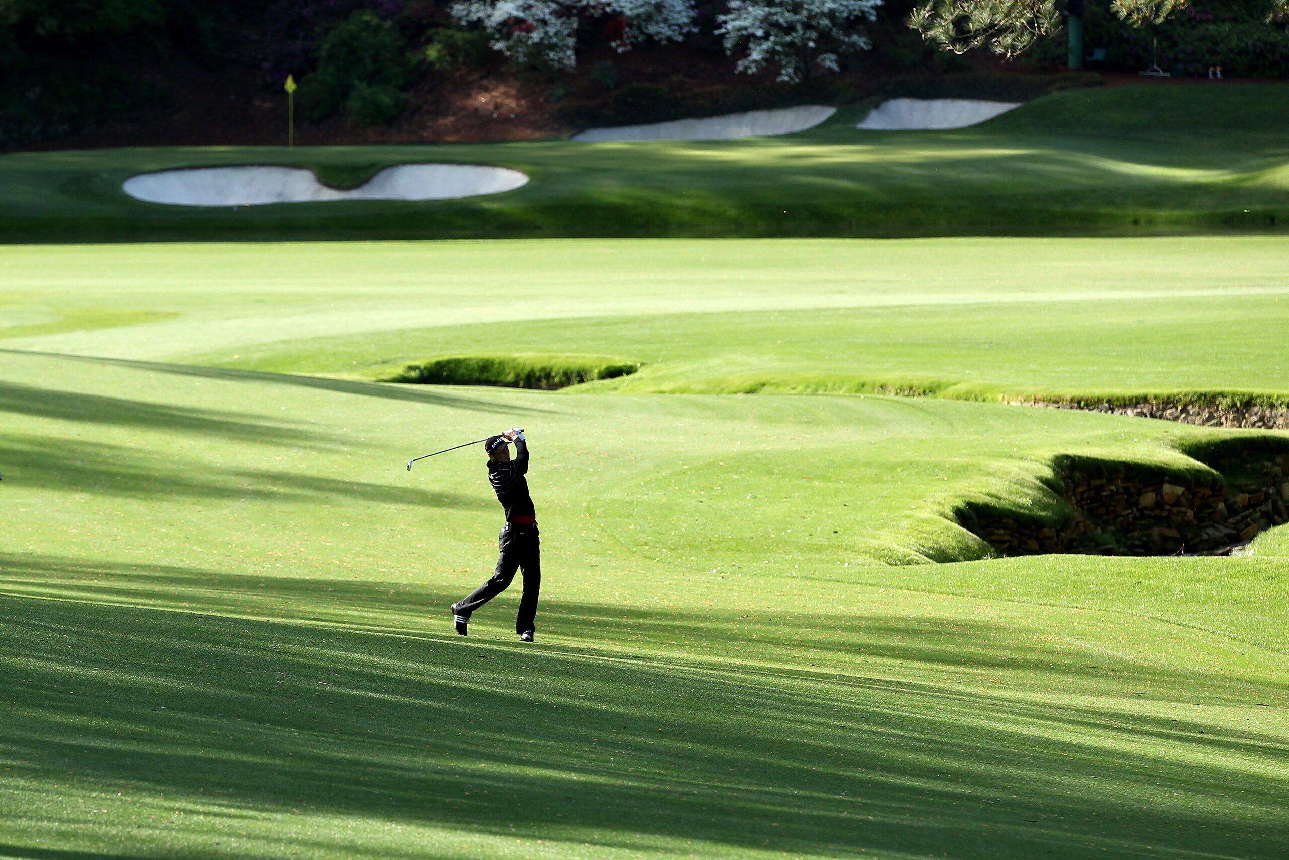 AUGUSTA, GA - APRIL 05:  Martin Kaymer of Germany watches a shot during a practice round prior to the 2011 Masters Tournament at Augusta National Golf Club on April 5, 2011 in Augusta, Georgia.  (Photo by Andrew Redington/Getty Images)