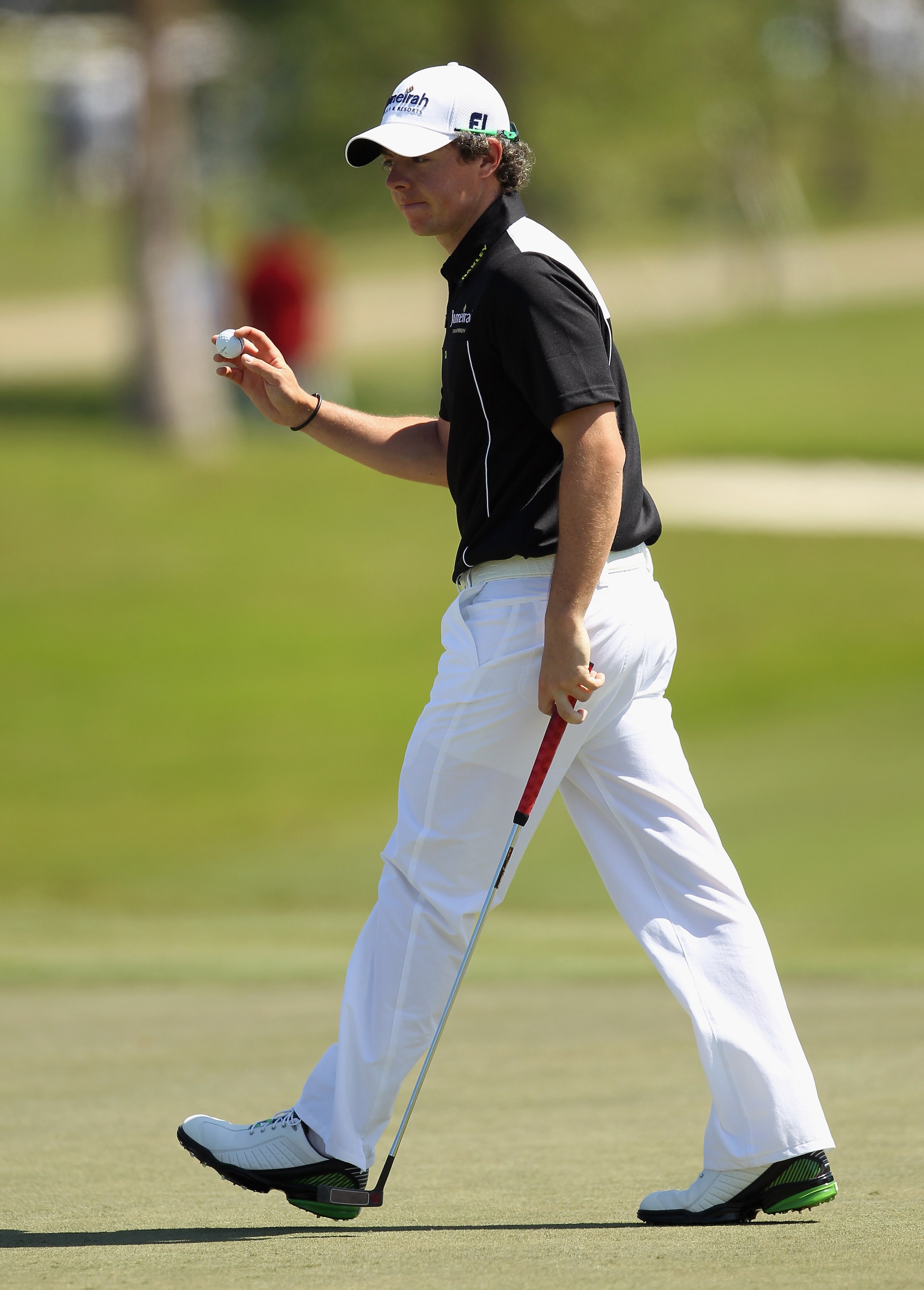 DORAL, FL - MARCH 13:  Rory McIlroy of Northern Ireland waves to the gallery on the first green during the final round of the 2011 WGC- Cadillac Championship at the TPC Blue Monster at the Doral Golf Resort and Spa on March 13, 2011 in Doral, Florida.  (P