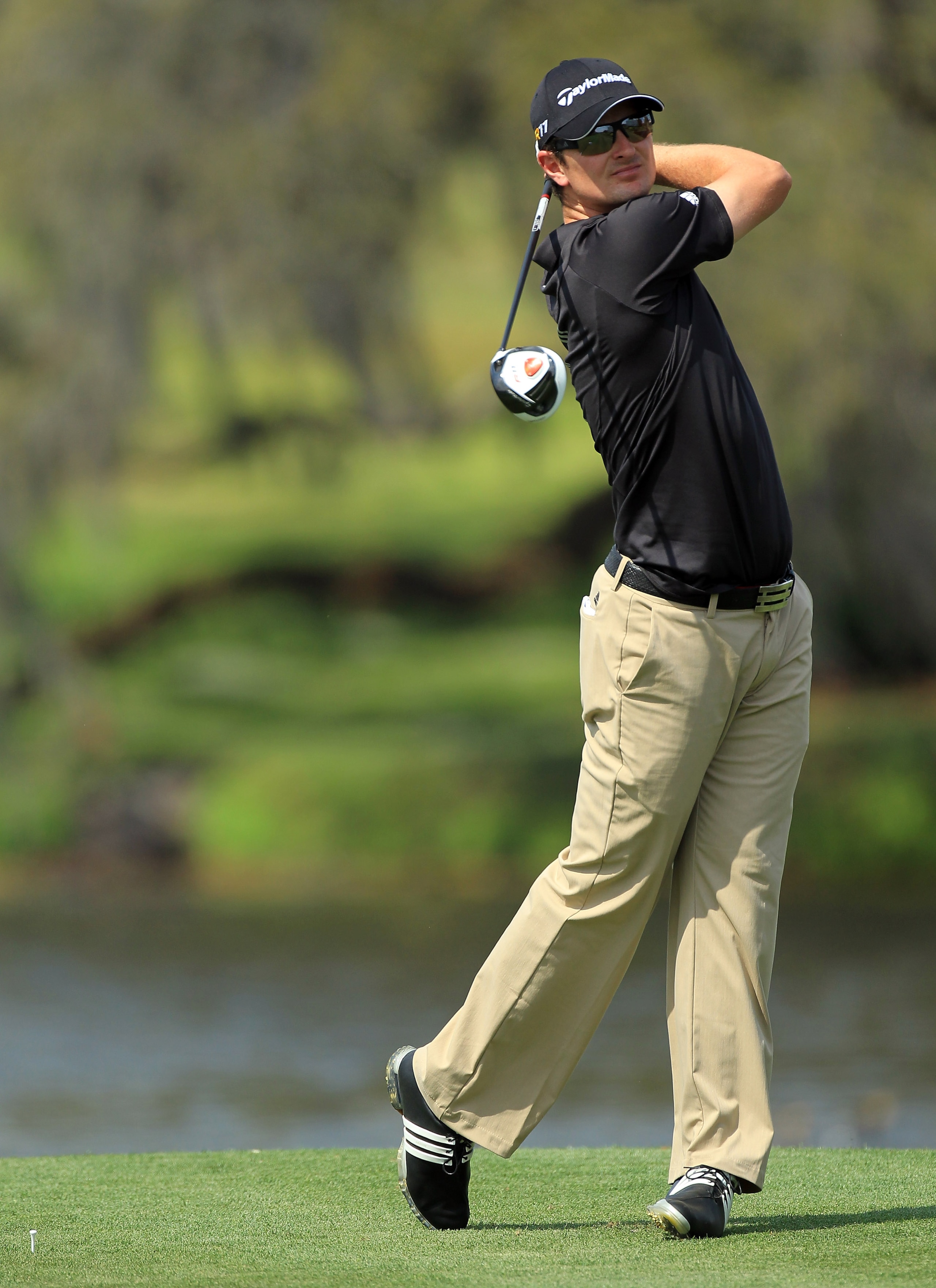 ORLANDO, FL - MARCH 27:  Justin Rose of England plays his tee shot on the 16th hole during the final round of the 2011 Arnold Palmer Invitational presented by Mastercard at the Bay Hill Lodge and Country Club on March 27, 2011 in Orlando, Florida.  (Photo