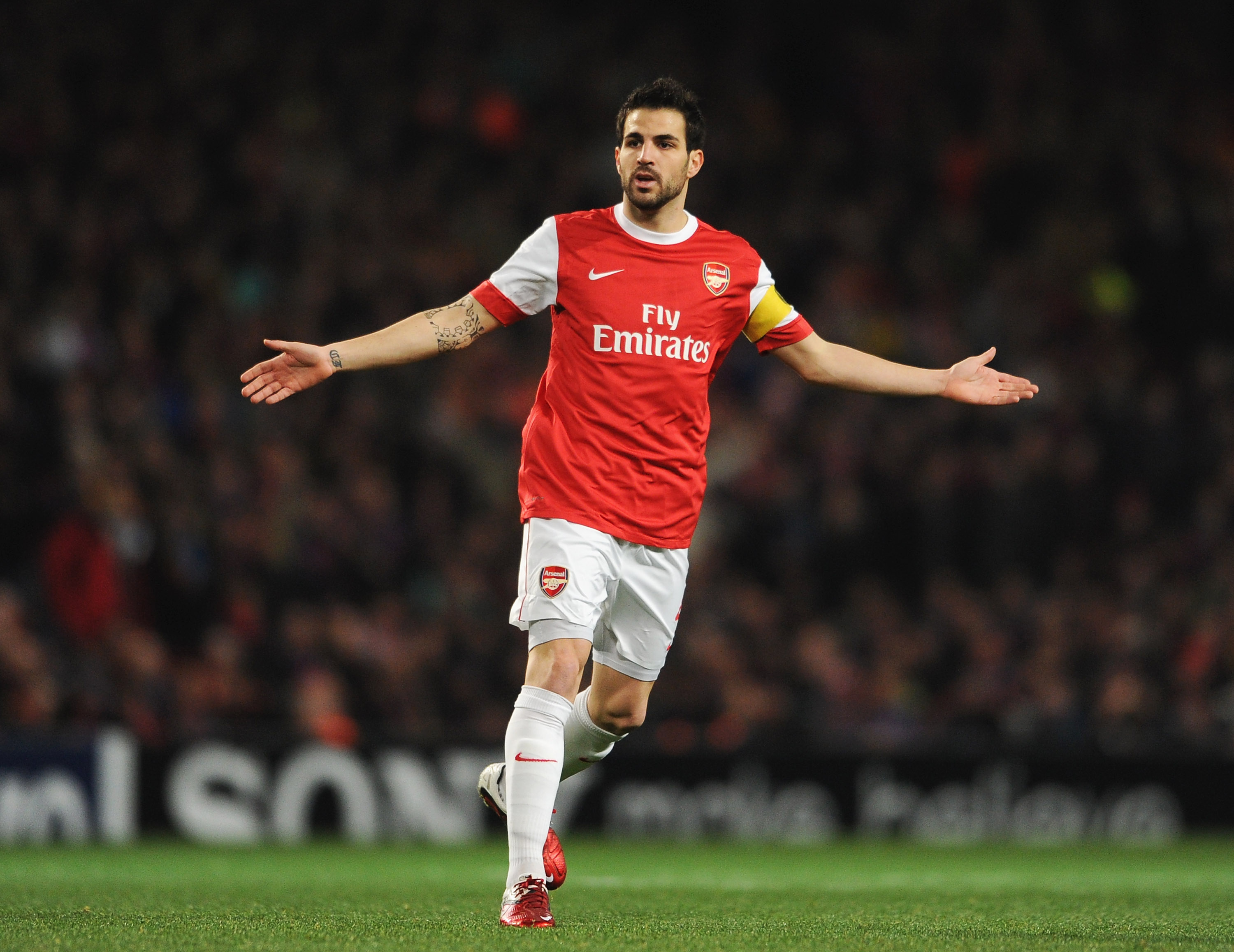 LONDON, ENGLAND - FEBRUARY 16:  Cesc Fabregas of Arsenal shows his frustration during the UEFA Champions League round of 16 first leg match between Arsenal and Barcelona at the Emirates Stadium on February 16, 2011 in London, England.  (Photo by Jasper Ju