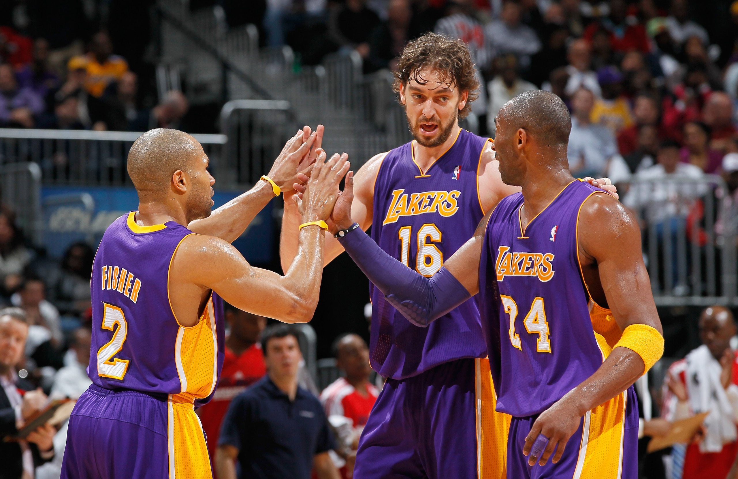 ATLANTA, GA - MARCH 08: Derek Fisher #2, Pau Gasol #16 and Kobe Bryant #24 of the Los Angeles Lakers react after a timeout during the game against the Atlanta Hawks at Philips Arena on March 8, 2011 in Atlanta, Georgia. NOTE TO USER: User expressly ackn ATLANTA, GA - MARCH 08: Derek Fisher #2, Pau Gasol #16 and Kobe Bryant #24 of the Los Angeles Lakers react after a timeout during the game against the Atlanta Hawks at Philips Arena on March 8, 2011 in Atlanta, Georgia. NOTE TO USER: User expressly ackn