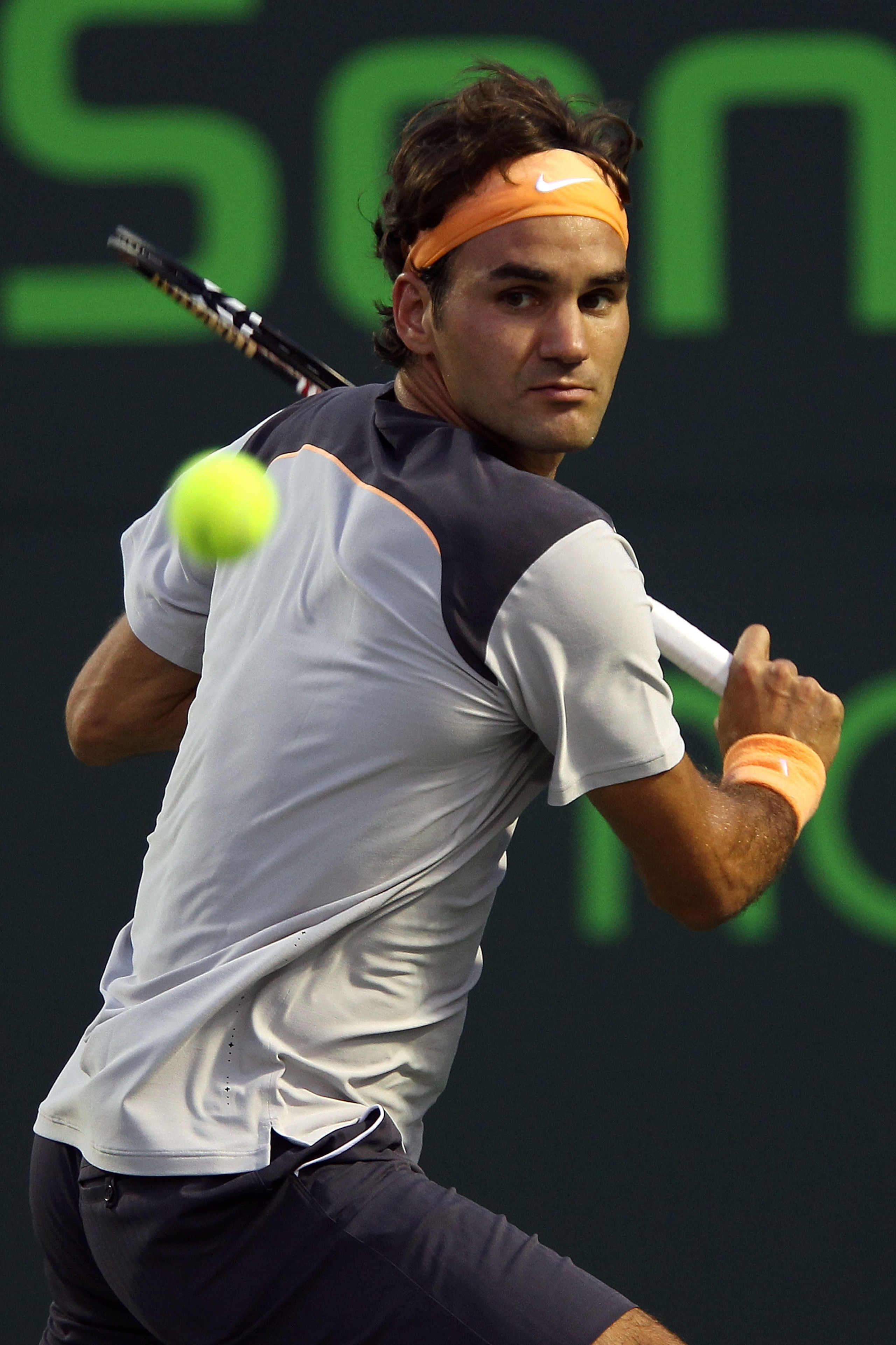 KEY BISCAYNE, FL - APRIL 01:  Roger Federer of Switzerland gets set to hit a backhand return against Rafael Nadal of Spain during their men's semifinal match at the Sony Ericsson Open at Crandon Park Tennis Center on April 1, 2011 in Key Biscayne, Florida
