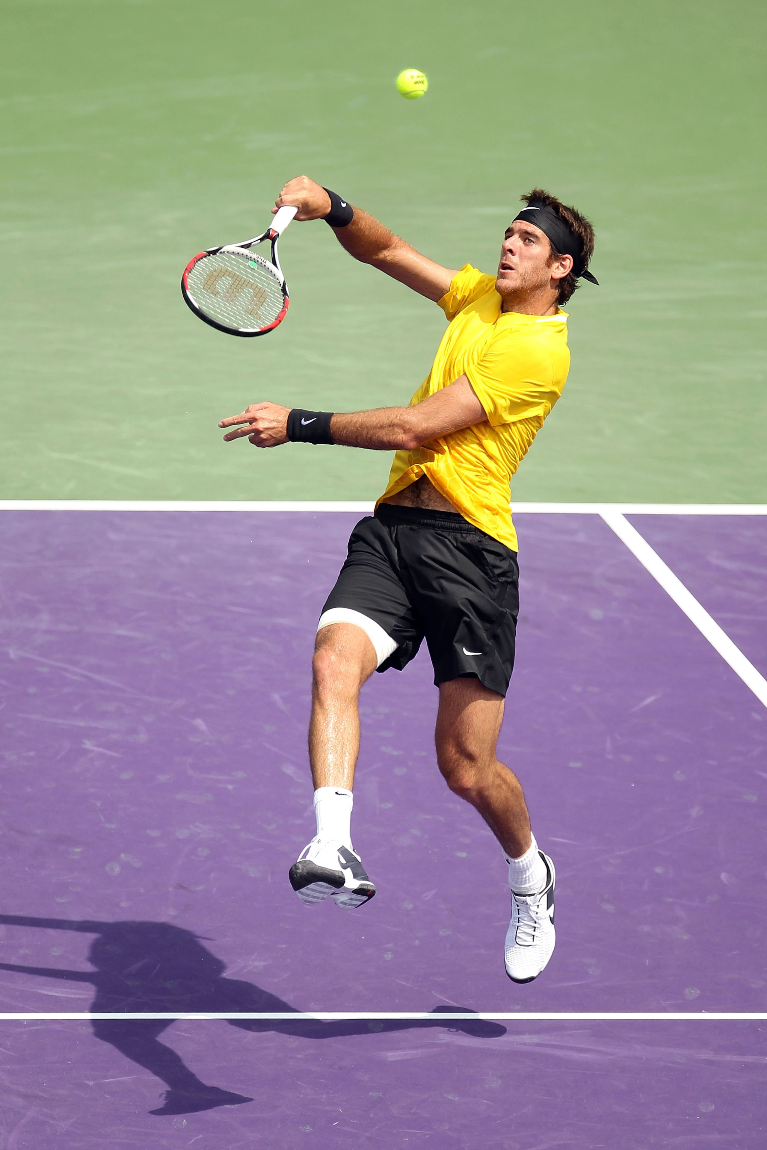 KEY BISCAYNE, FL - MARCH 29:  Juan Martin Del Potro of Argentina hits a overhand return against Mardy Fish during the Sony Ericsson Open at Crandon Park Tennis Center on March 29, 2011 in Key Biscayne, Florida.  (Photo by Mike Ehrmann/Getty Images)