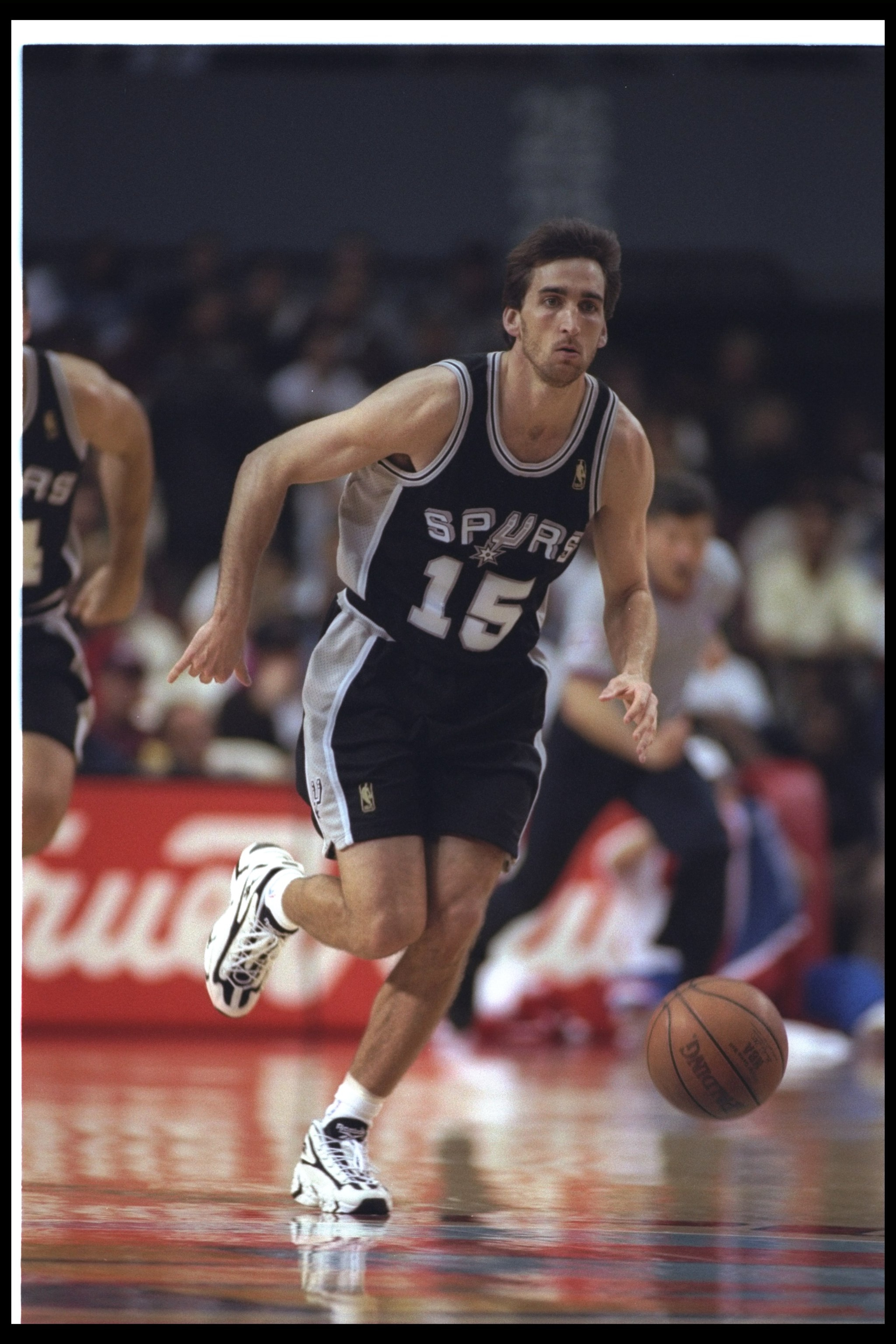 24 Mar 1997: Guard Vinny Del Negro of the San Antonio Spurs moves the ball during a game against the Los Angeles Clippers at the Los Angeles Sports Arena in Los Angeles, California. The Clippers won the game, 106-91. Mandatory Credit: Harry How /Allspo 24 Mar 1997: Guard Vinny Del Negro of the San Antonio Spurs moves the ball during a game against the Los Angeles Clippers at the Los Angeles Sports Arena in Los Angeles, California. The Clippers won the game, 106-91. Mandatory Credit: Harry How /Allspo