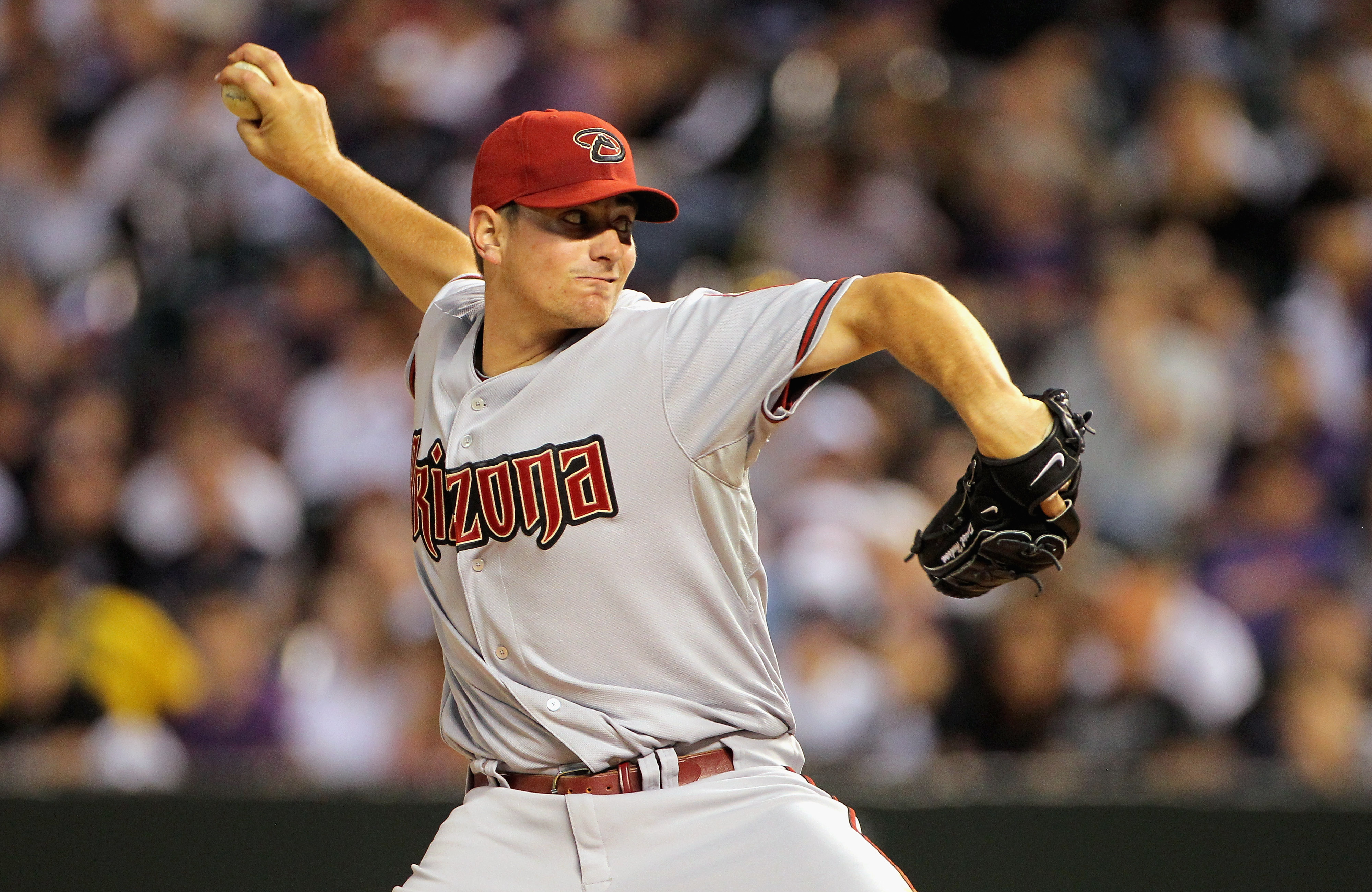 DENVER, CO - APRIL 02:  Starting pitcher Daniel Hudson #41 of the Arizona Diamondbacks delivers against the Colorado Rockies at Coors Field on April 2, 2011 in Denver, Colorado.  (Photo by Doug Pensinger/Getty Images)