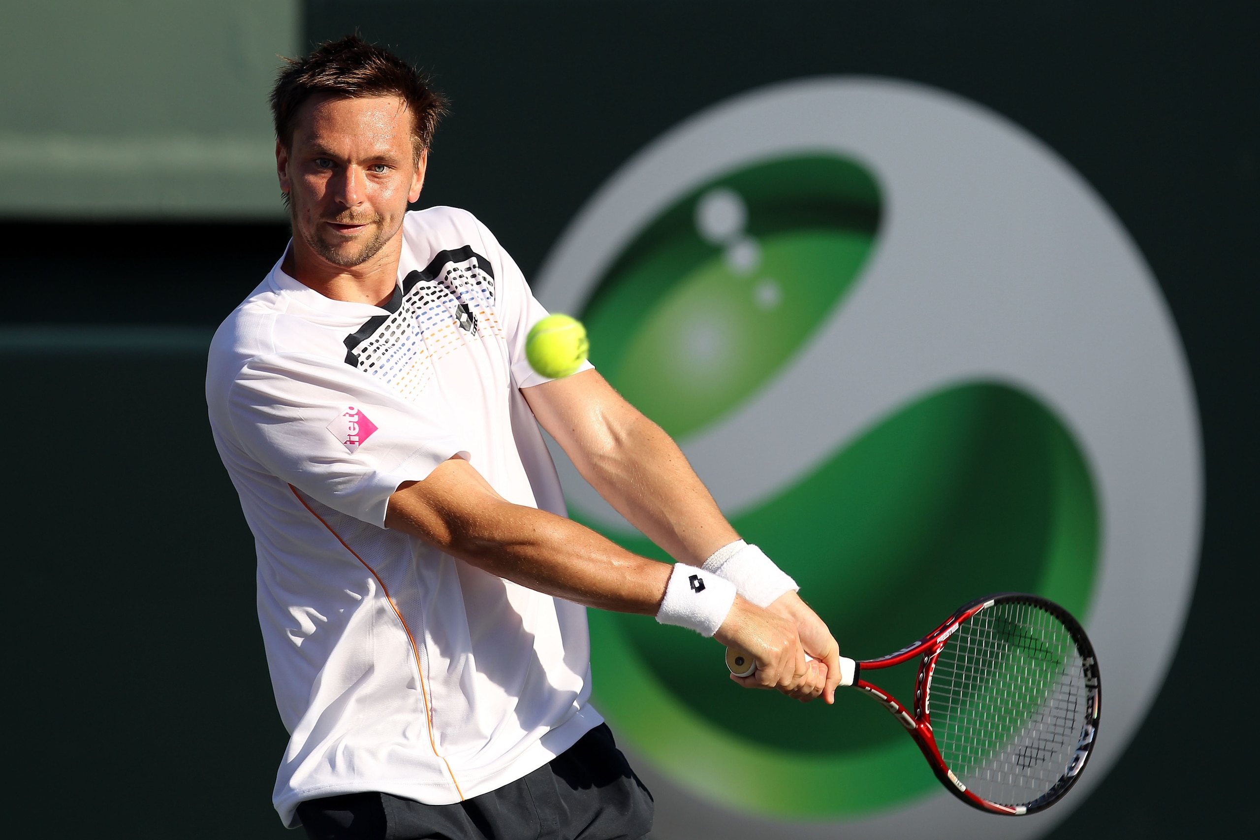 KEY BISCAYNE, FL - MARCH 27:  Robin Soderling of Sweden hits a backhand return against Juan Martin Del Potro of Argentina during the Sony Ericsson Open at Crandon Park Tennis Center on March 27, 2011 in Key Biscayne, Florida.  (Photo by Al Bello/Getty Ima
