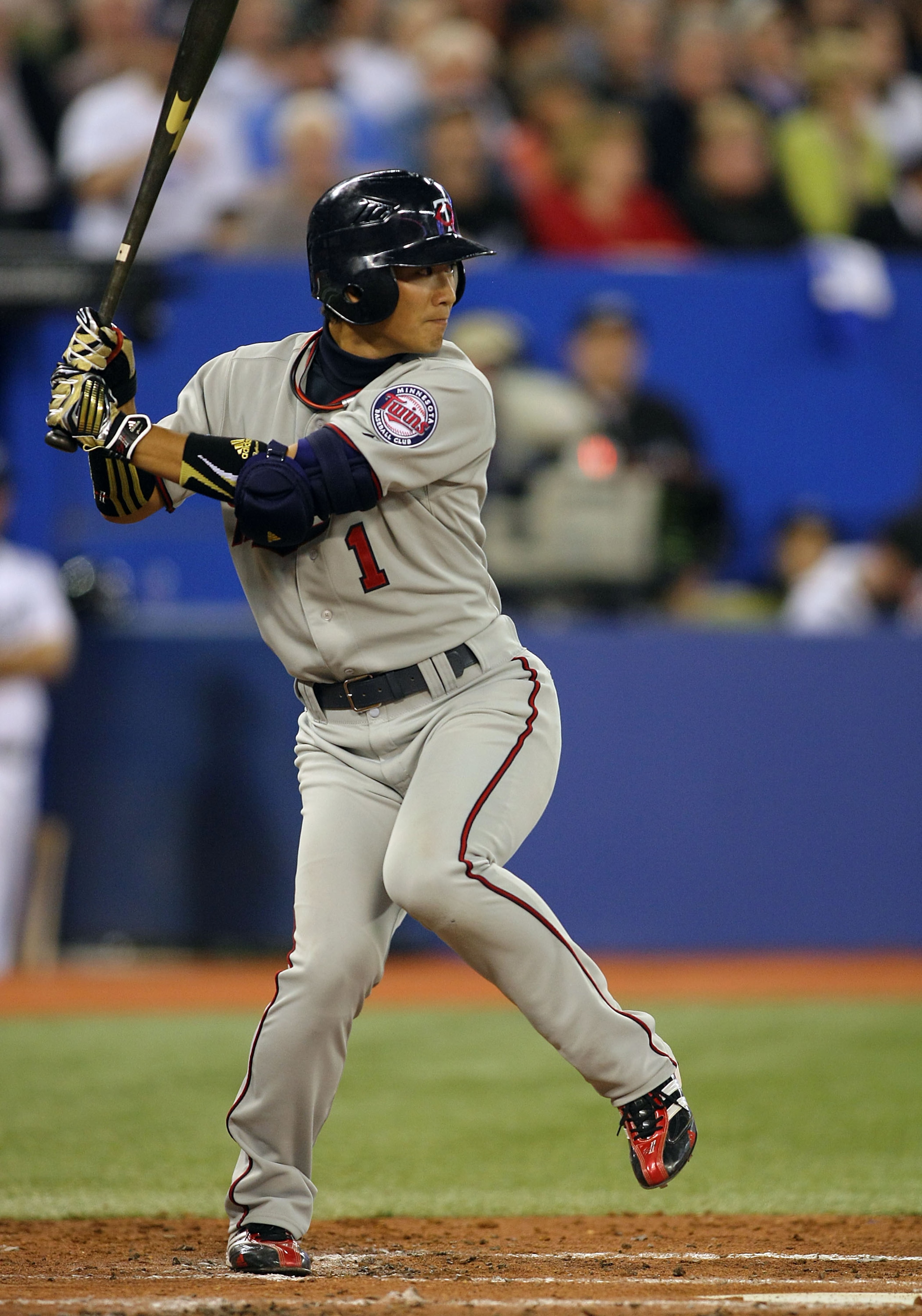 TORONTO,CANADA - APRIL 1:  Tsuyoshi Nishioka #1 of the Minnesota Twins bats against the Toronto Blue Jays on opening day during their MLB game at the Rogers Centre April 1, 2011 in Toronto, Ontario, Canada.(Photo By Dave Sandford/Getty Images)