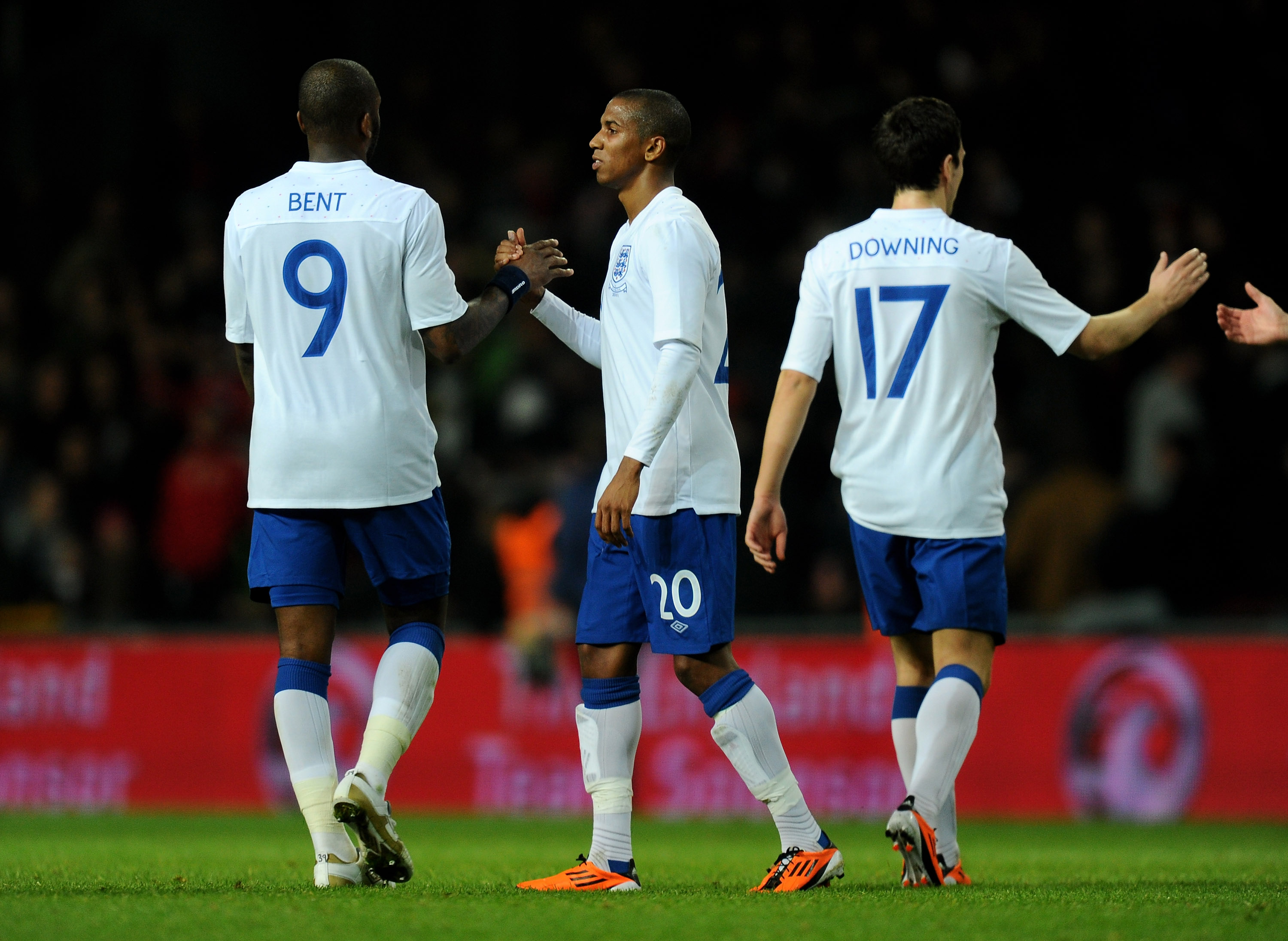 COPENHAGEN, DENMARK - FEBRUARY 09:  Ashley Young of England is congratulated by team mate Darren Bent after scoring his team's second goal during the International Friendly match between Denmark and England at Parken Stadium on February 9, 2011 in Copenha