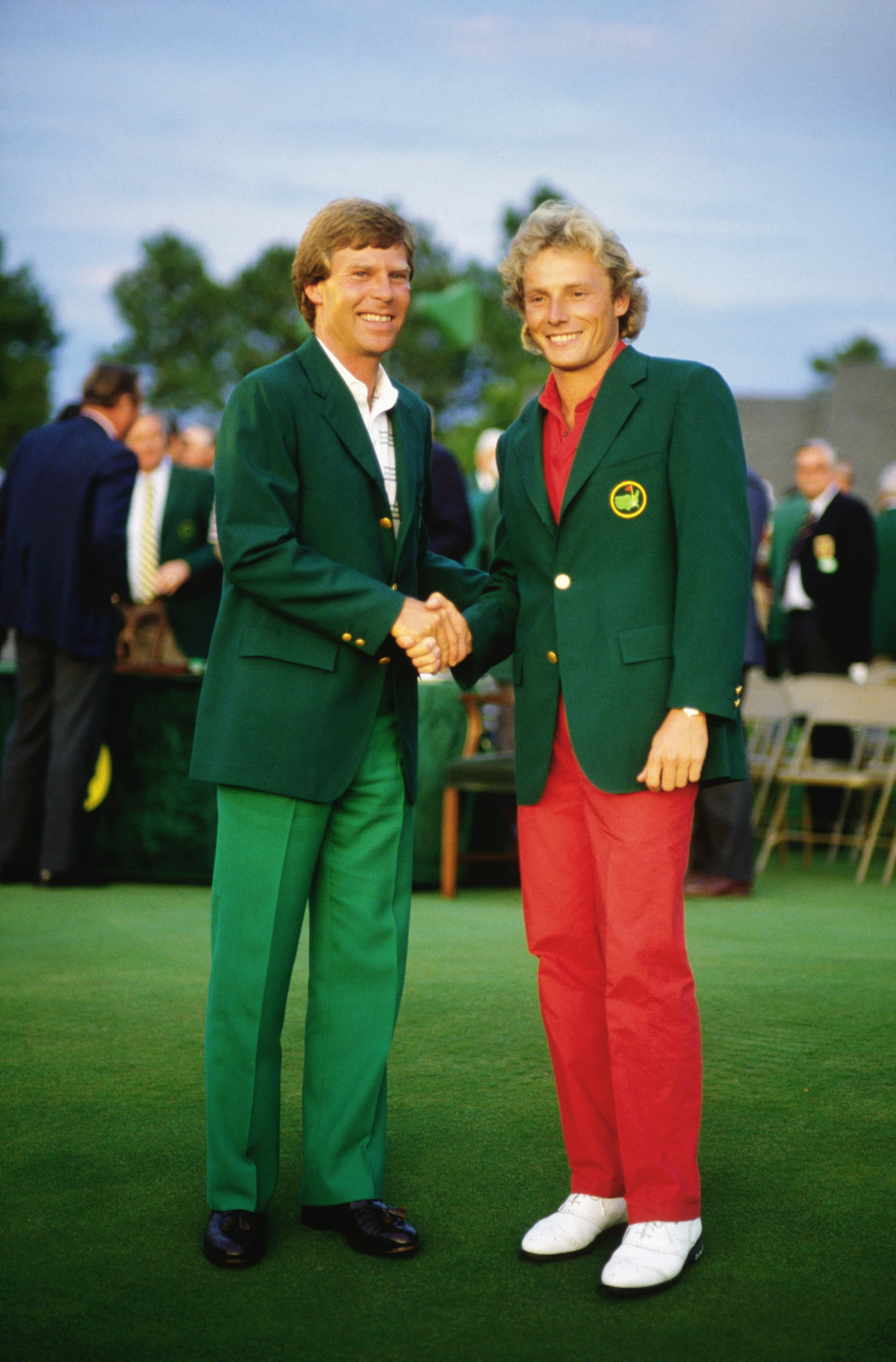 AUGUSTA,GA - APRIL 14: Bernhard Langer of Germany is presented with the green jacket by Ben Crenshaw of USA after the final round of the Masters, held at The Augusta National Golf Club on April 14, 1985  in Augusta, GA.  (Photo by David Cannon/Getty Image