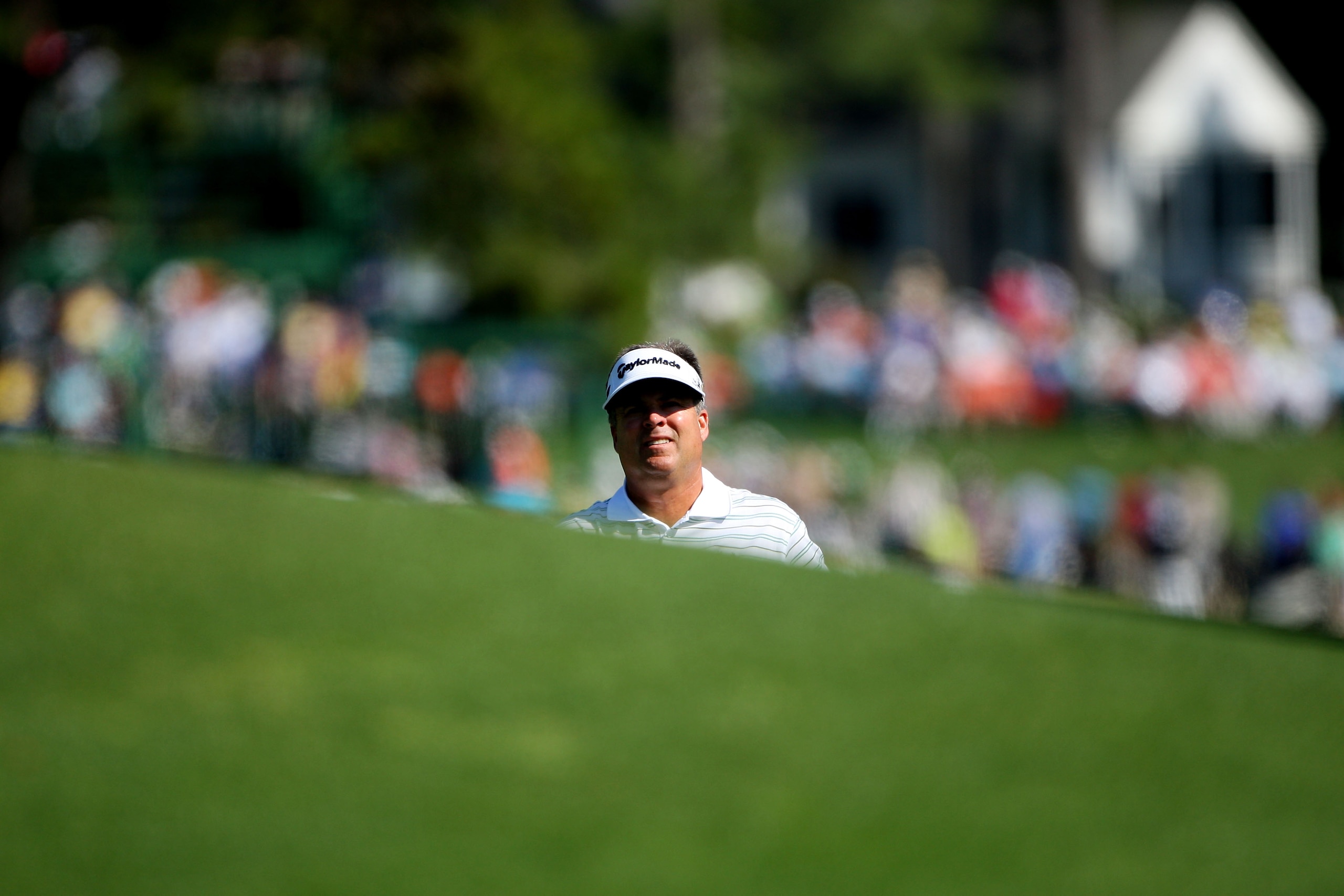 AUGUSTA, GA - APRIL 12:  Kenny Perry evaluates his shot during the final round of the 2009 Masters Tournament at Augusta National Golf Club on April 12, 2009 in Augusta, Georgia.  (Photo by Andrew Redington/Getty Images)