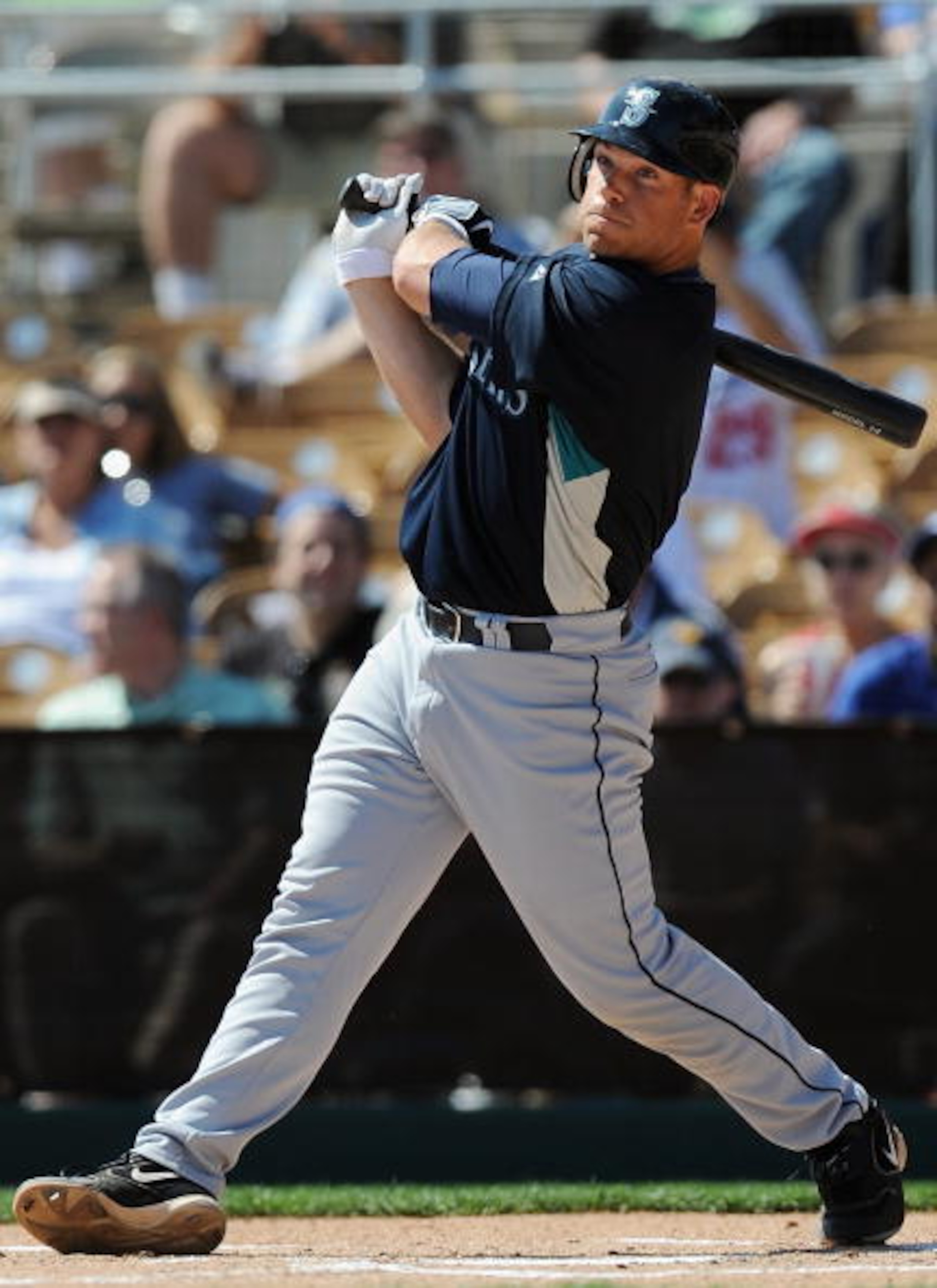 GLENDALE, AZ - MARCH 07:   Jeff Clement #9 of the Seattle Mariners bats during a Spring Training game against the Los Angeles Dodgers at Camelback Ranch on March 7, 2009 in Glendale, Arizona.  (Photo by Lisa Blumenfeld/Getty Images)