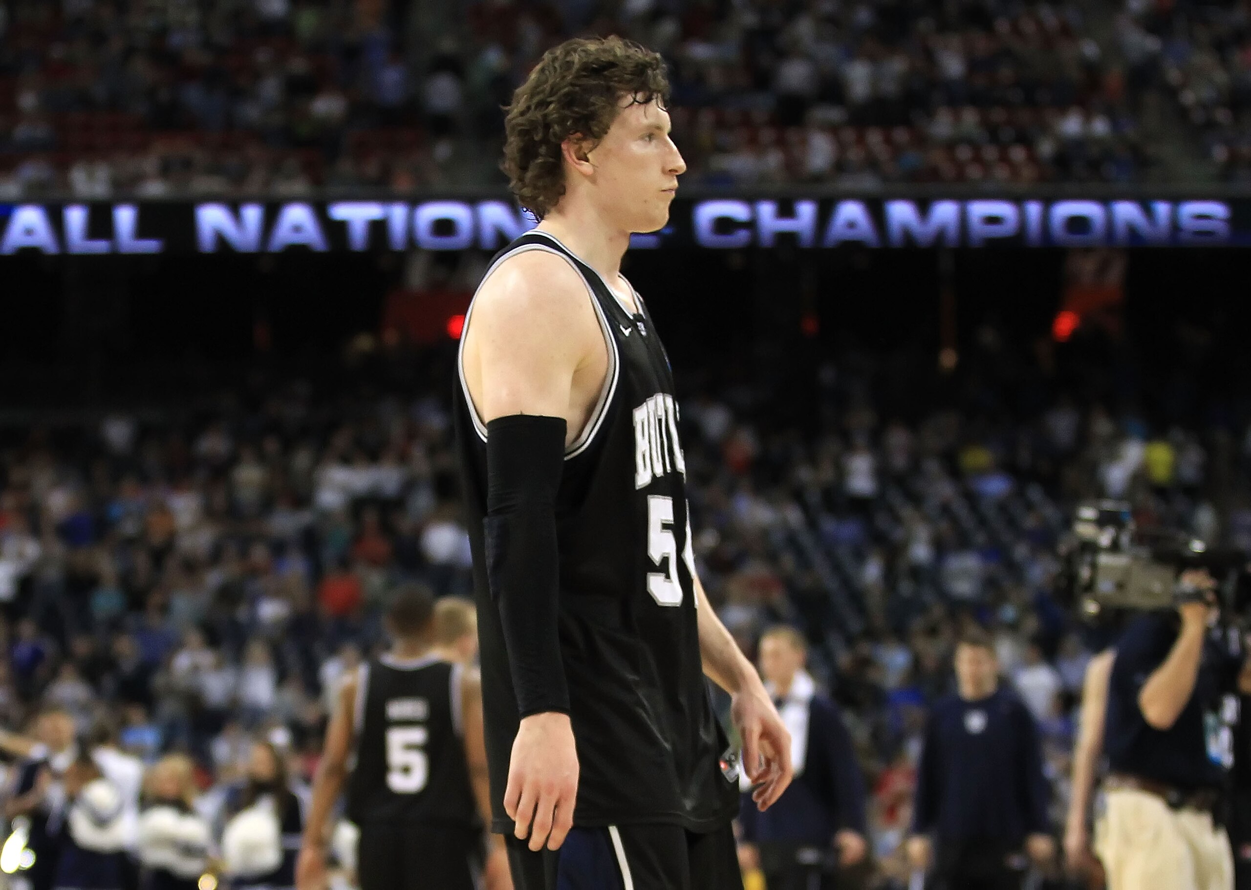 HOUSTON, TX - APRIL 04: Matt Howard #54 of the Butler Bulldogs walks off of the court after losing to the Connecticut Huskies in the National Championship Game of the 2011 NCAA Division I Men's Basketball Tournament at Reliant Stadium on April 4, 2011 in HOUSTON, TX - APRIL 04: Matt Howard #54 of the Butler Bulldogs walks off of the court after losing to the Connecticut Huskies in the National Championship Game of the 2011 NCAA Division I Men's Basketball Tournament at Reliant Stadium on April 4, 2011 in