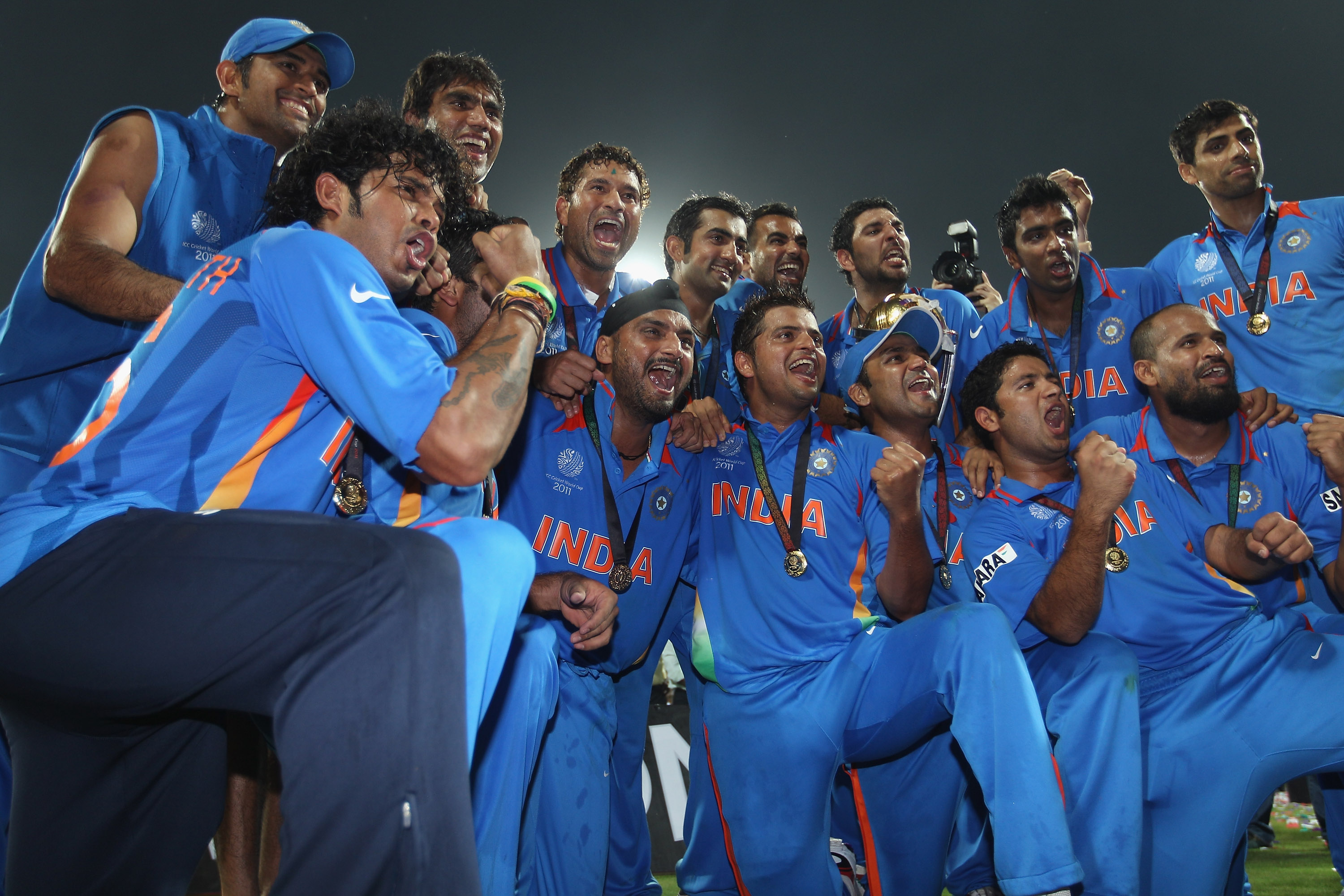 MUMBAI, INDIA - APRIL 02:  The India team celebrate their six wicket victory during the 2011 ICC World Cup Final between India and Sri Lanka at Wankhede Stadium on April 2, 2011 in Mumbai, India.  (Photo by Michael Steele/Getty Images)