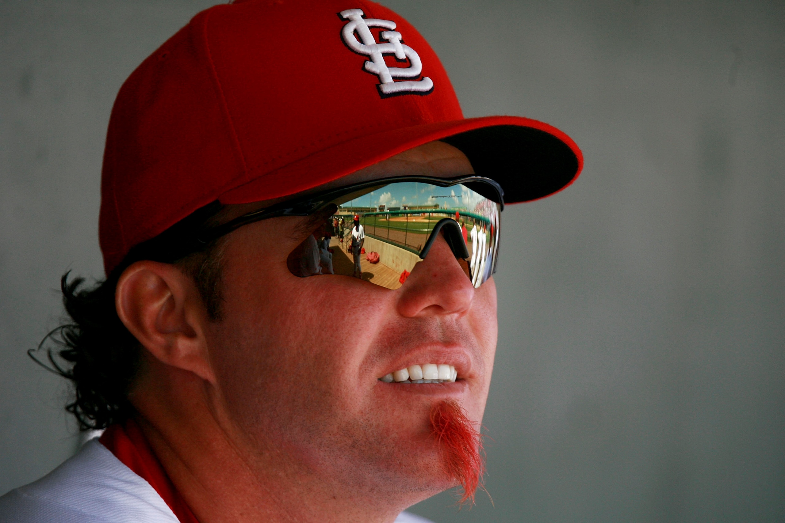 JUPITER, FL - MARCH 22:  Scott Spiezio #26 of the St. Louis Cardinals watches his team take on the Florida Marlins on March 22, 2007 at Roger Dean Stadium in Jupiter, Florida.  (Photo by Doug Benc/Getty Images)