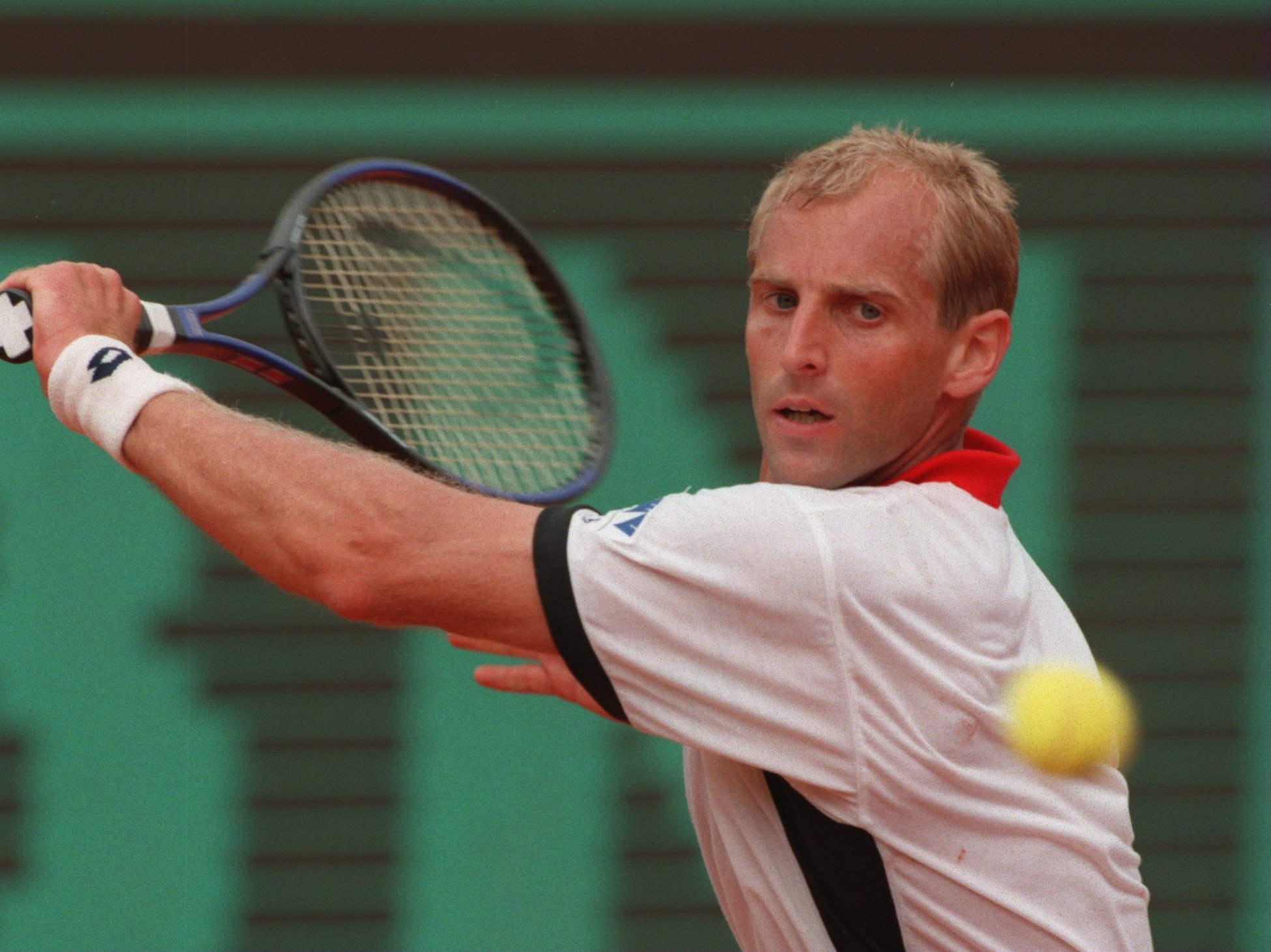 11 JUN 1995:  THOMAS MUSTER OF AUSTRIA HITS A BACKHAND RETURN AGAINST MICHAEL CHANG OF THE USA IN THE MENS SINGLES FINAL MATCH AT THE FRENCH OPEN TENNIS AT ROLAND GARROS STADIUM, PARIS. MUSTER WON THE MATCH IN THREE SETS 7-5, 6-2, 6-4  TO TAKE THE FRENCHO